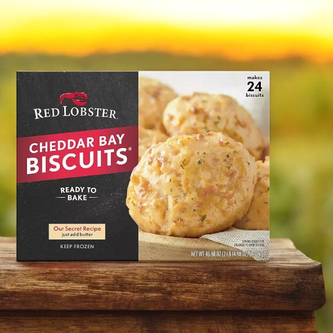Enjoy the delicious taste of Red Lobster Cheddar Bay Biscuits. This frozen case offers 24 ready-to-bake biscuits, loaded with savory cheddar cheese.