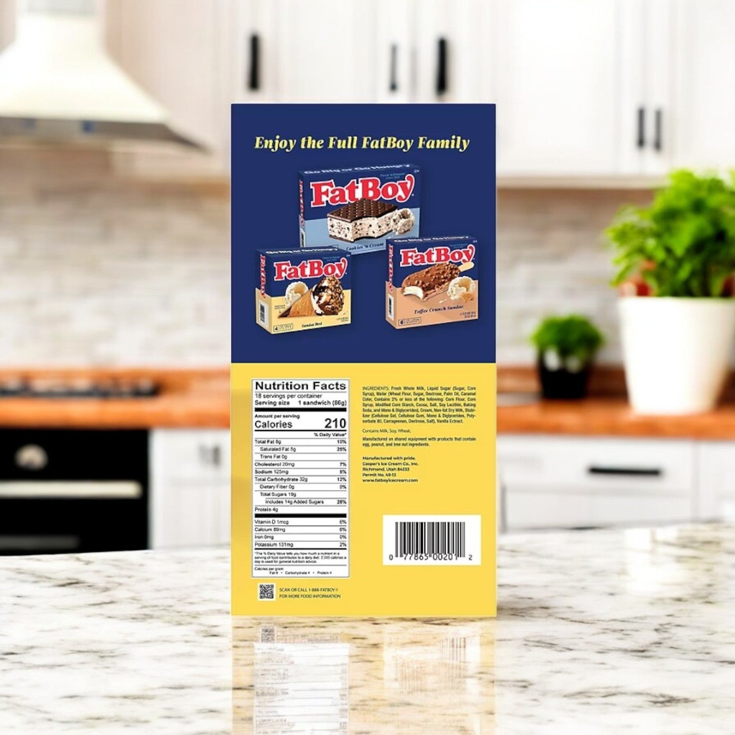 Back of a FatBoy Smores Sandwich Bars, 12 Count box on a kitchen counter, displaying product images, nutrition facts, and text promoting these FatBoy bars available at Sam’s Club.
