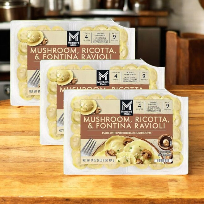 Three cases of Member's Mark Mushroom, Ricotta, and Fontina Ravioli (19 oz, 2 pk) are elegantly arranged on a wooden table, showcasing a premium frozen pasta delight.
