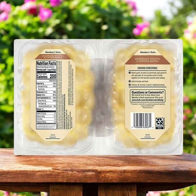 Close-up of packaged Member's Mark Mushroom, Ricotta, and Fontina Ravioli (19 oz, 2 pk- 3 Cases), showcasing nutrition facts and cooking instructions against a blurred floral background.
