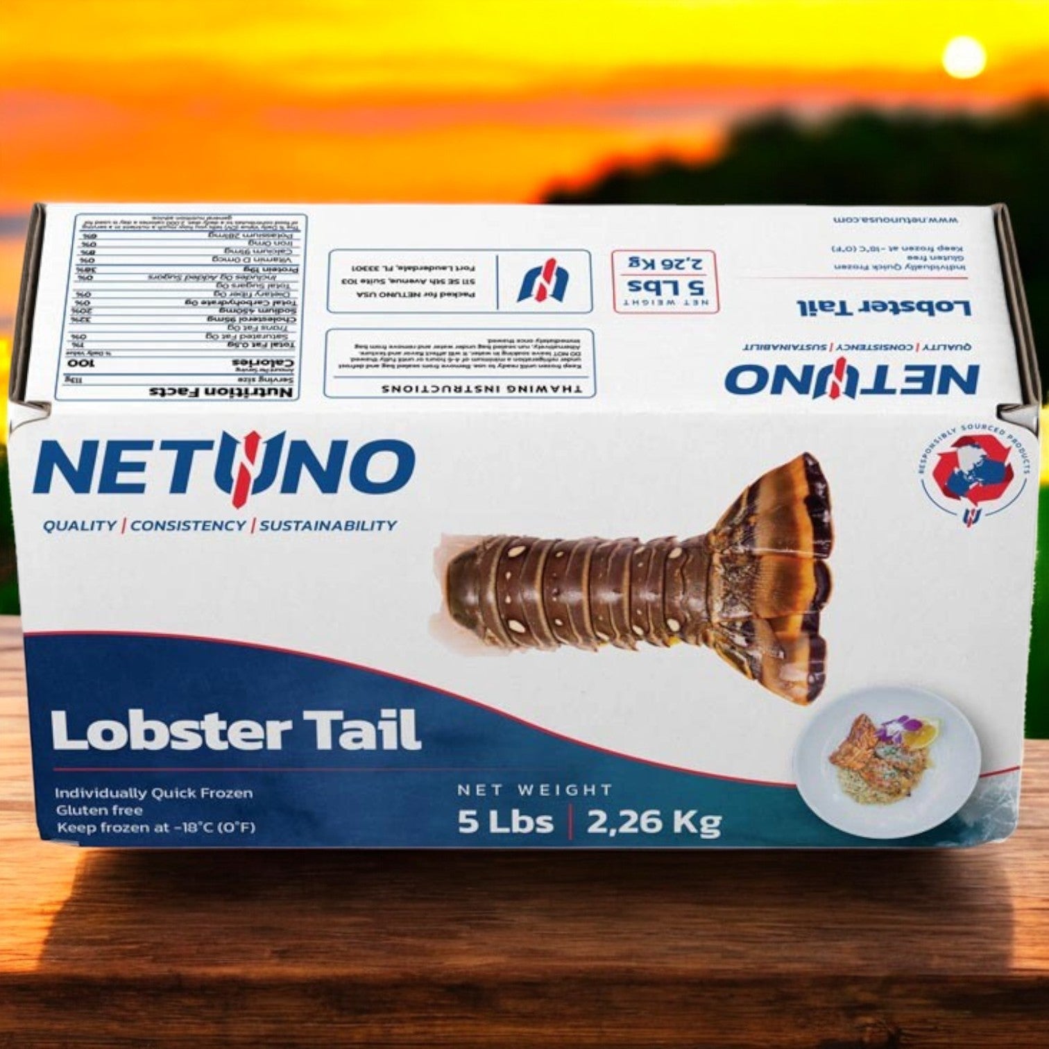 A 5 lb. box of Netuno Rock Lobster Tails with "Quality, Consistency, Sustainability" against a sunset backdrop. Perfect for gourmet dining occasions, it features an image of a lobster tail.