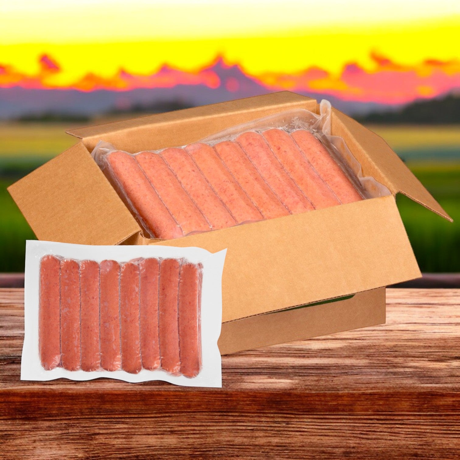 An open box of Nathan’s Famous Sausage Polish – 10 lbs. Case is on a wooden table, highlighting one package with six-inch franks. The backdrop features a sunset view across the landscape.