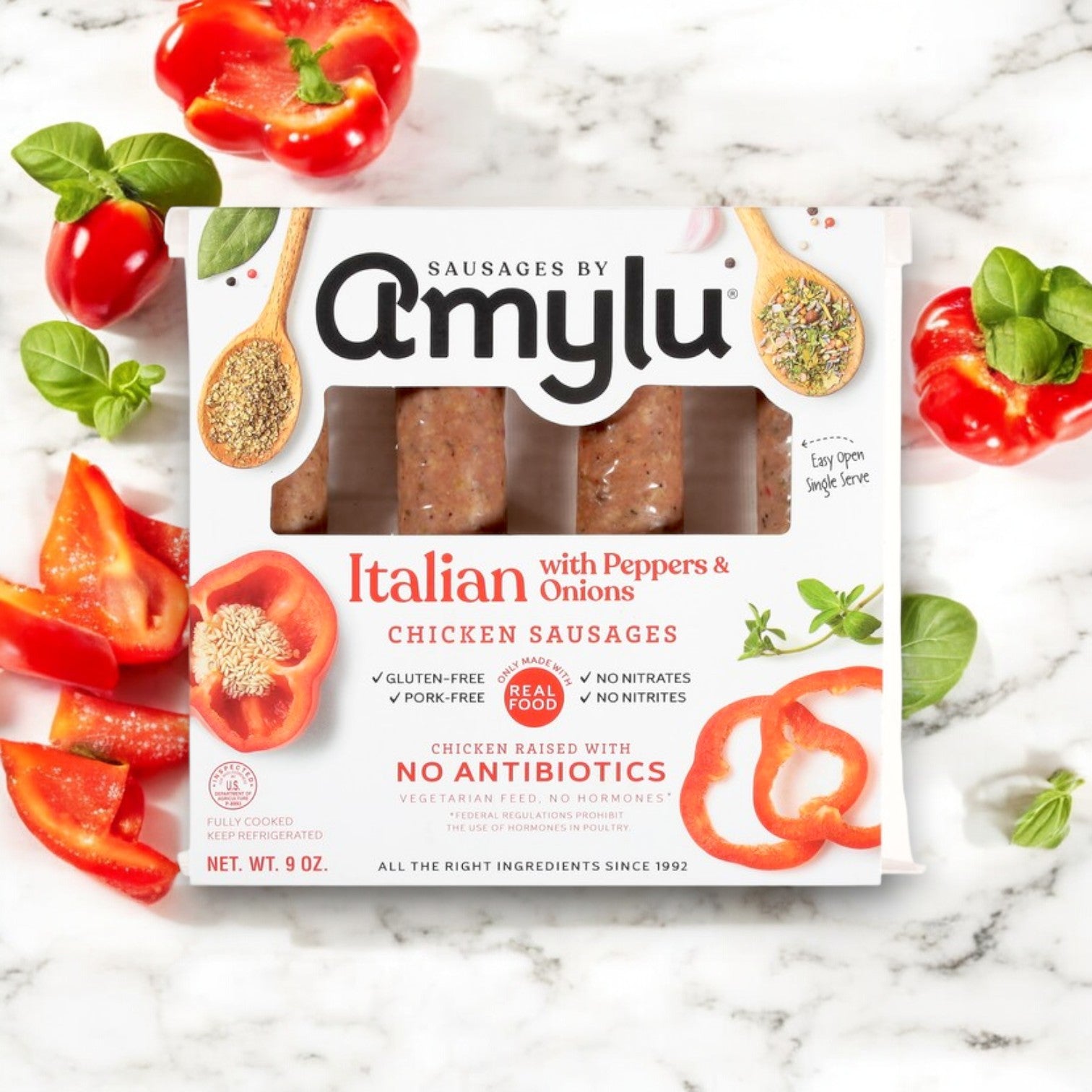 Amylu's Italian Chicken Sausage with Peppers & Onions offers a vibrant taste of Italy with sliced red peppers, onions, and aromatic herbs in a convenient 9 oz gluten-free package.