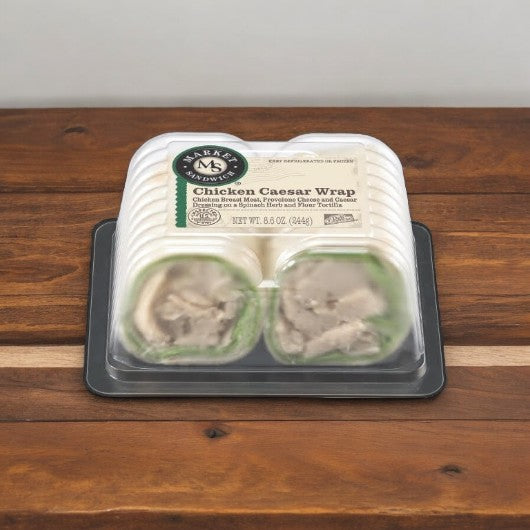 The E.A. Sween Chicken Caesar Wrap is packed in a clear container, featuring a savory filling with crisp lettuce. It ships frozen and offers 30 days of shelf life once refrigerated, promising balanced nutrition for your meal.