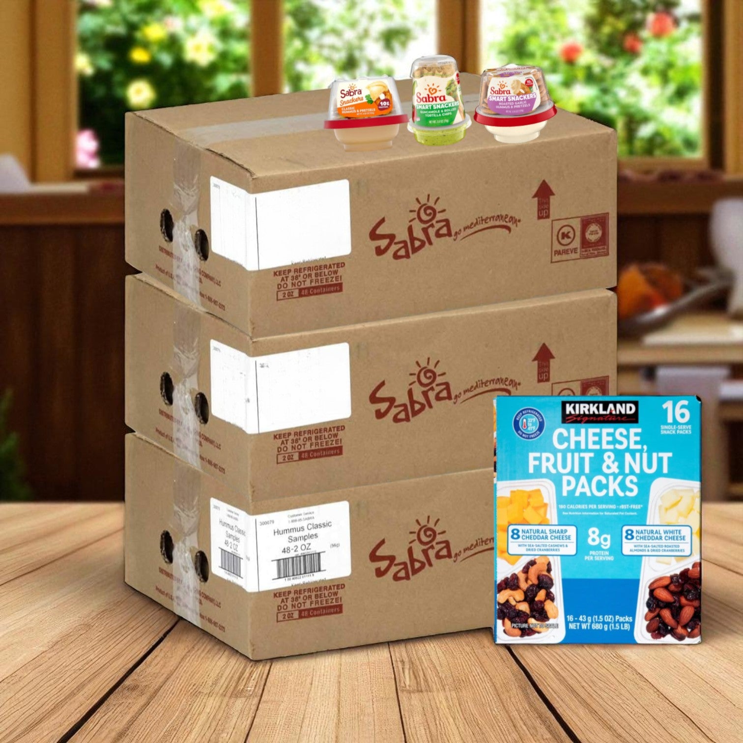 Snack Box - 12 Sabra Roasted Garlic Hummus, 12 Sabra Classic Hummus, 12 Sabra Guacamole & Tostitos, 16 Kirkland Cheese Fruit Nut Packs