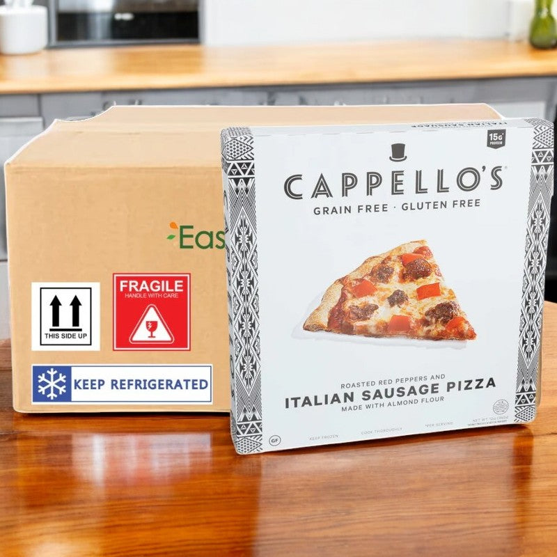 A Cappello's Italian Sausage with Roasted Red Peppers Pizza, 12 oz., rests on a wooden surface next to a labeled cardboard box containing 1 case of 6 packs with handling instructions.