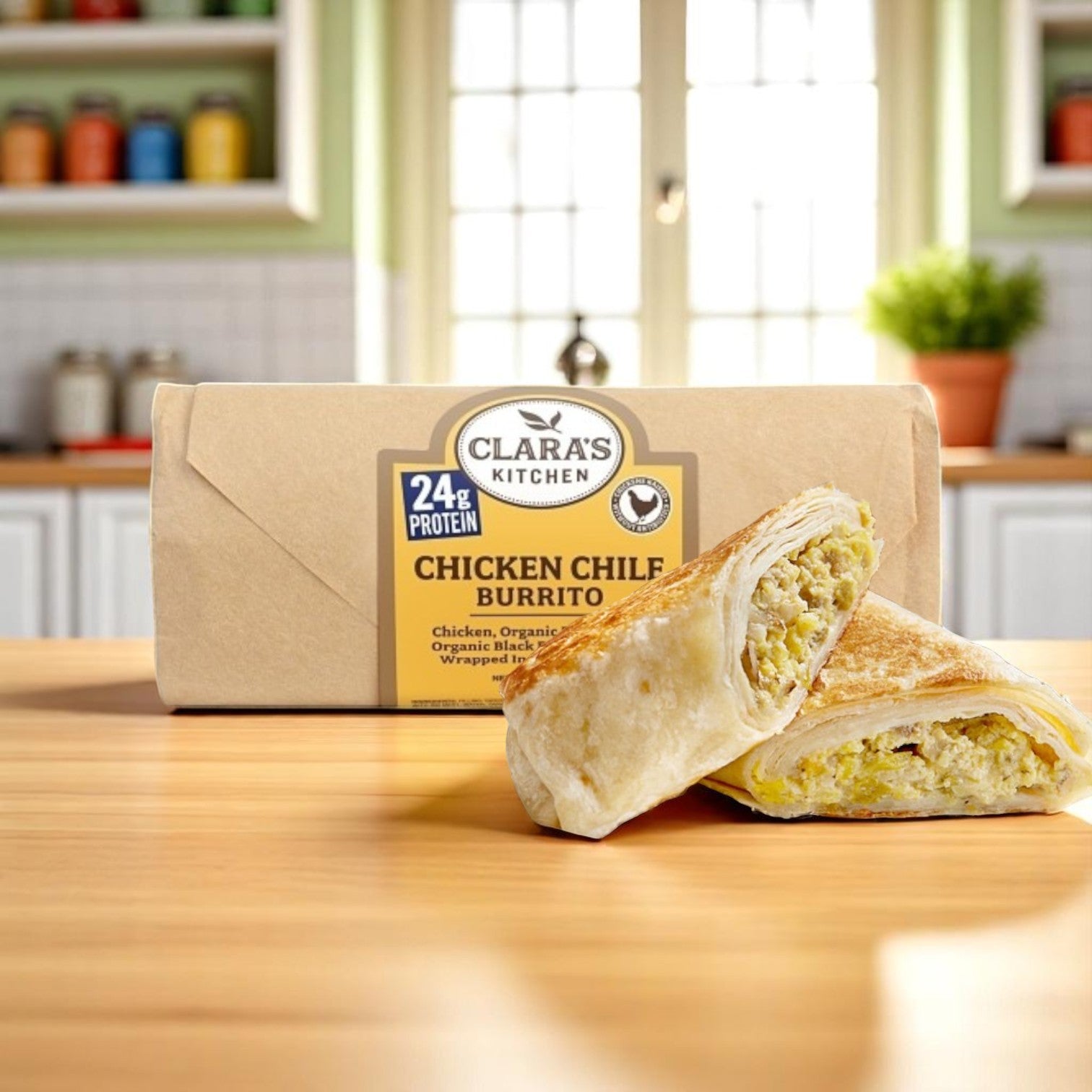 The 8 oz. Clara's Kitchen Individually Packaged Chicken Chile Burrito is perfect for any adventure, with a hearty filling revealed when sliced open, making it an ideal on-the-go meal.