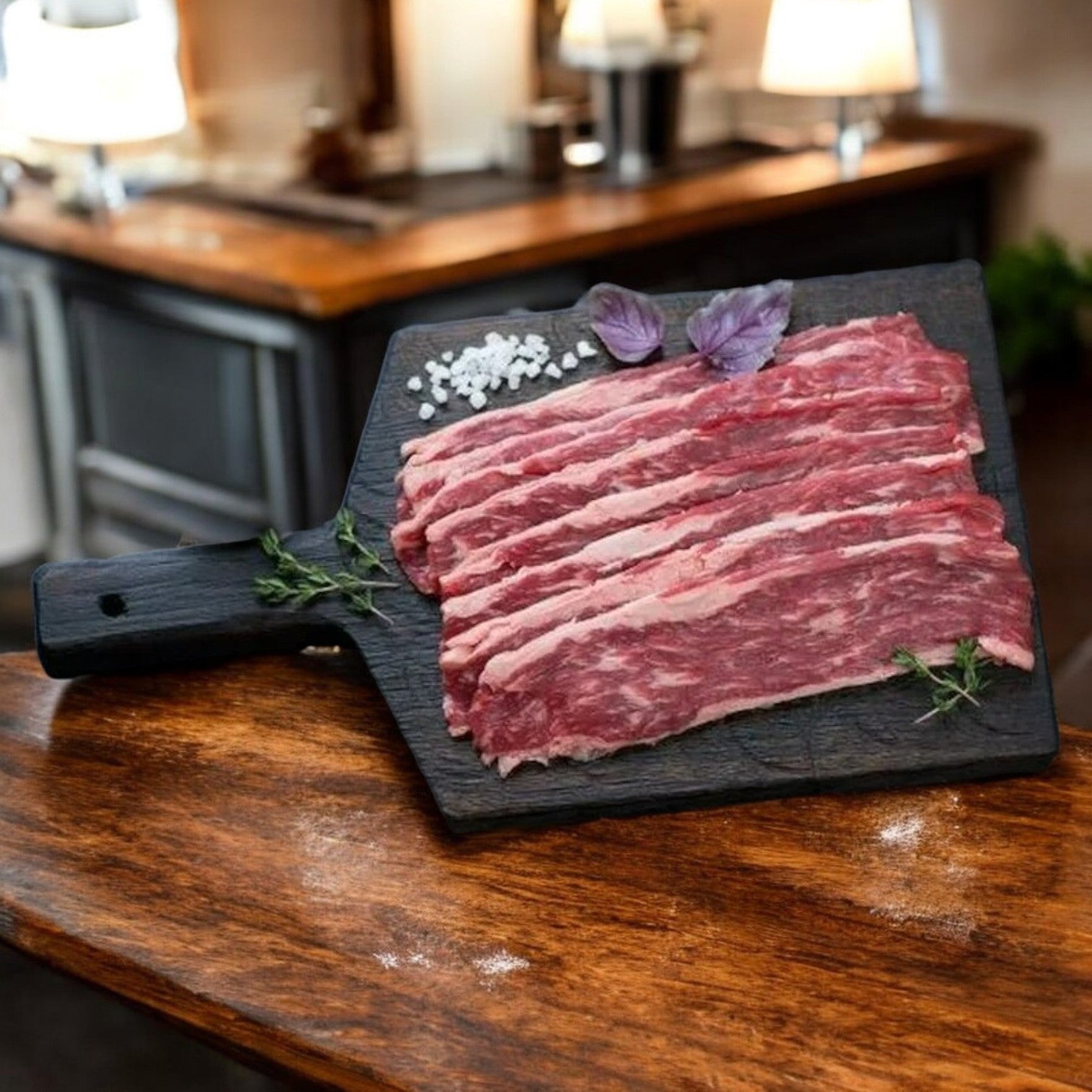 Deen Halal Beef Bacon, a lean protein option, rests appealingly on a black cutting board on the kitchen's wooden counter, seasoned with salt and herbs.