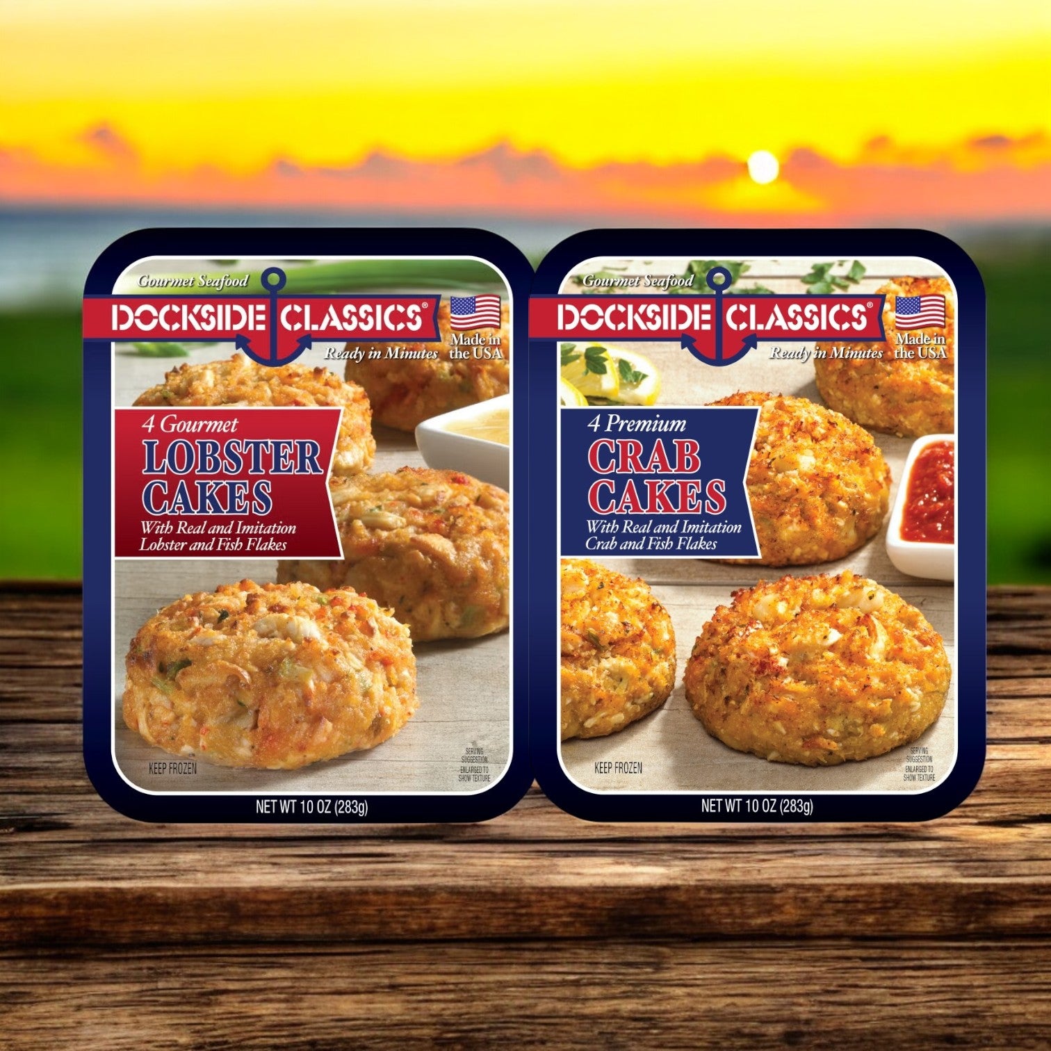 The Dockside Classics Gourmet Crab Cakes and Combo! packages sit on a wooden table, creating a premium seafood experience with a blurred sunset backdrop.
