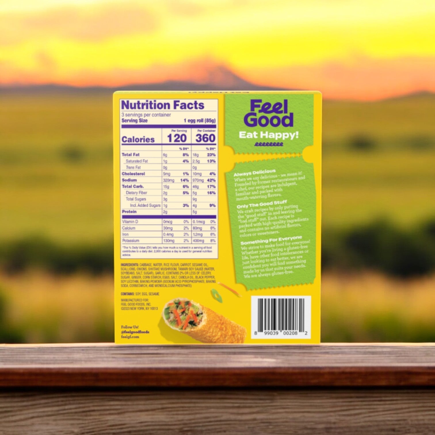 Back of a Feel Good Foods package featuring nutritional facts and a serving suggestion image of their allergen-friendly Gluten-Free Vegetable Egg Rolls, 9 oz, set against a blurred outdoor background.