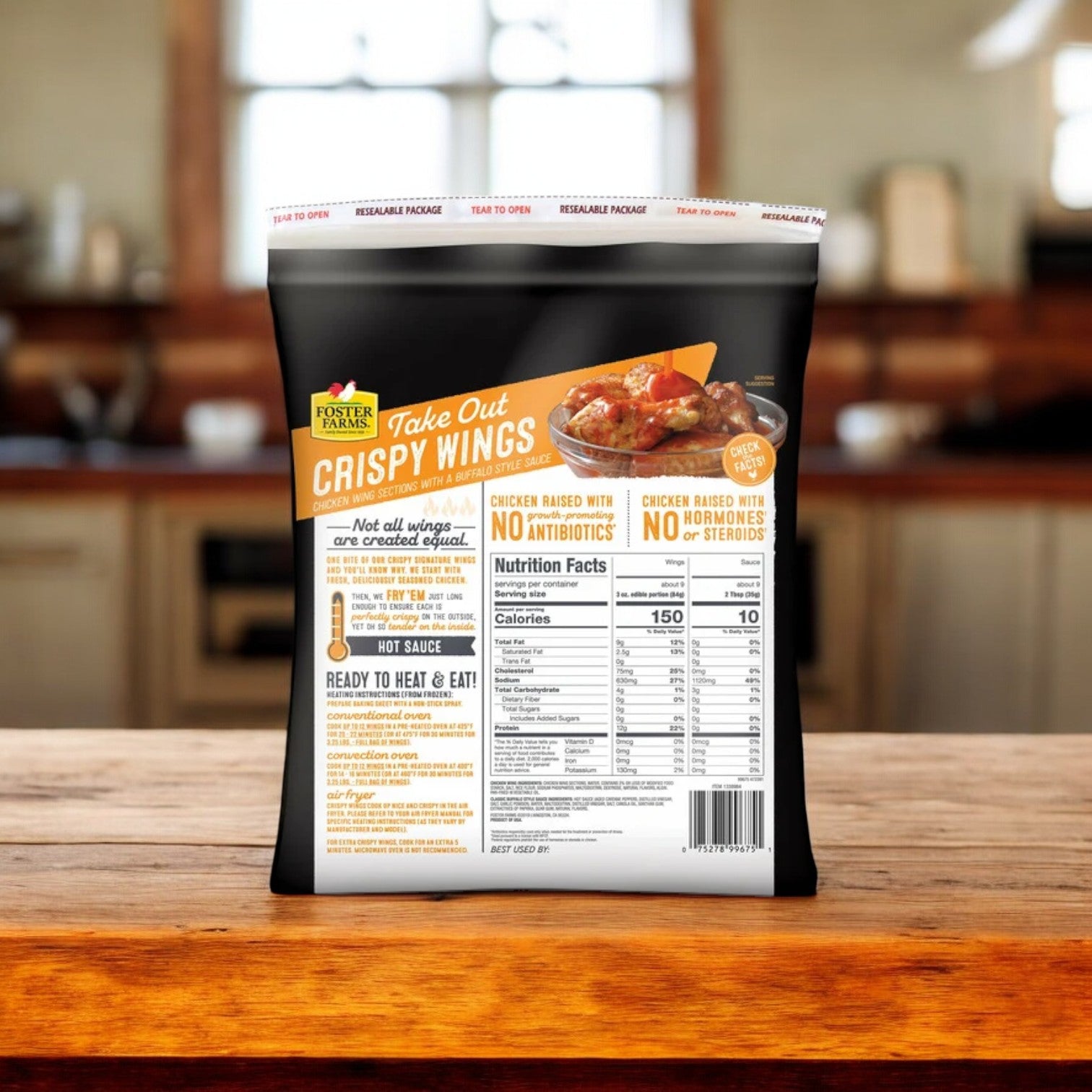 A bag of Foster Farms Take Out Crispy Chicken Wings, Classic Buffalo, 4 lbs - 1 Count sits on a kitchen counter. The packaging prominently features "No Antibiotics" and includes detailed nutritional information and cooking instructions, ideal for anyone craving classic Buffalo-style crispy chicken wings.