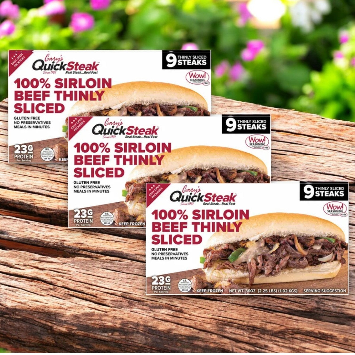Three 36 oz boxes of Gary's Quick Steak by Gary's, featuring premium 100% sirloin beef, are thinly sliced on a wooden surface. Each highlights 23g of protein per serving and includes an image of a steak sandwich, offering versatile meal options.