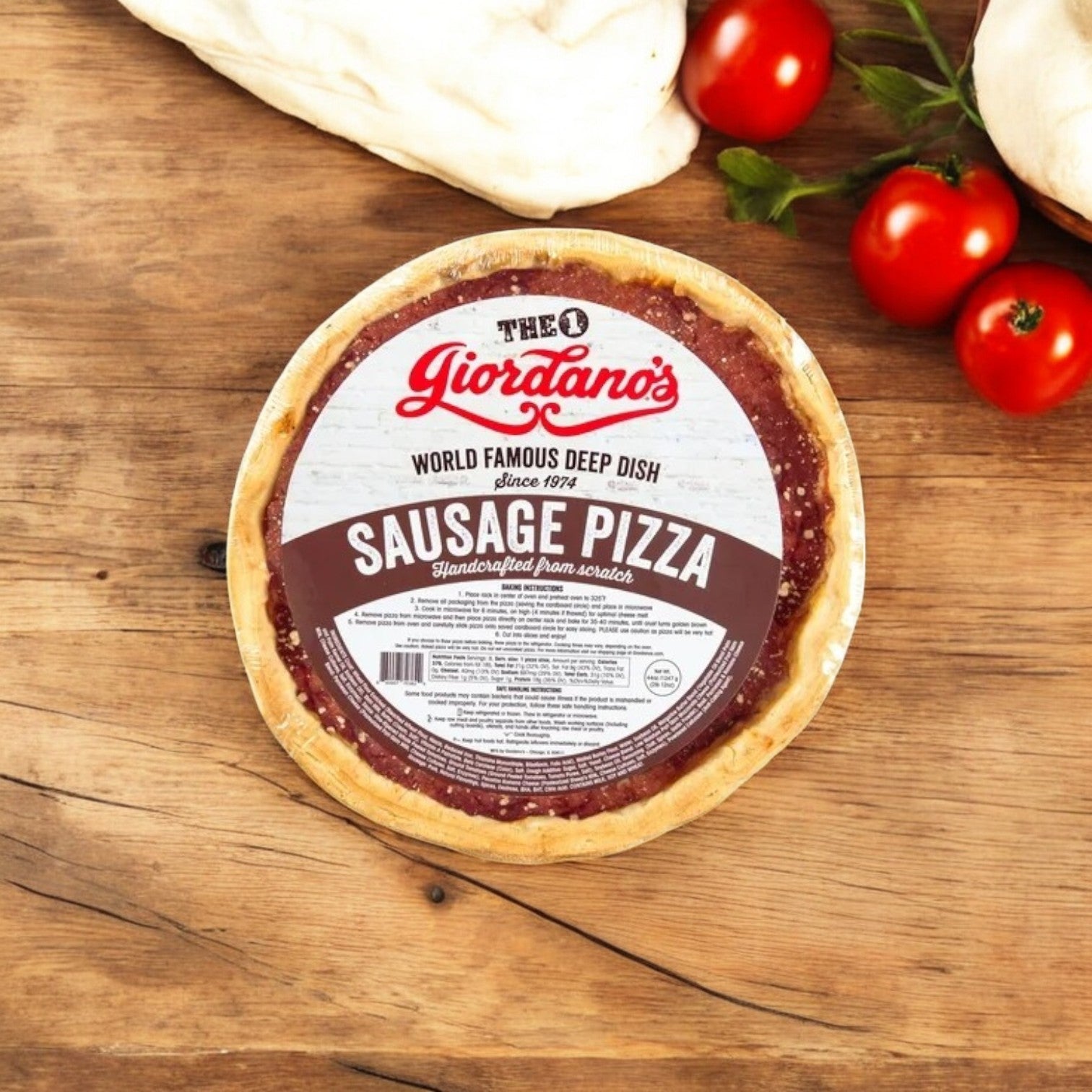 A Giordano's Deep Dish Pizza Combo Pack, featuring 3 deep dish pizzas, sits on a wooden surface with ripe tomatoes and garlic, embodying Chicago's pizza essence.