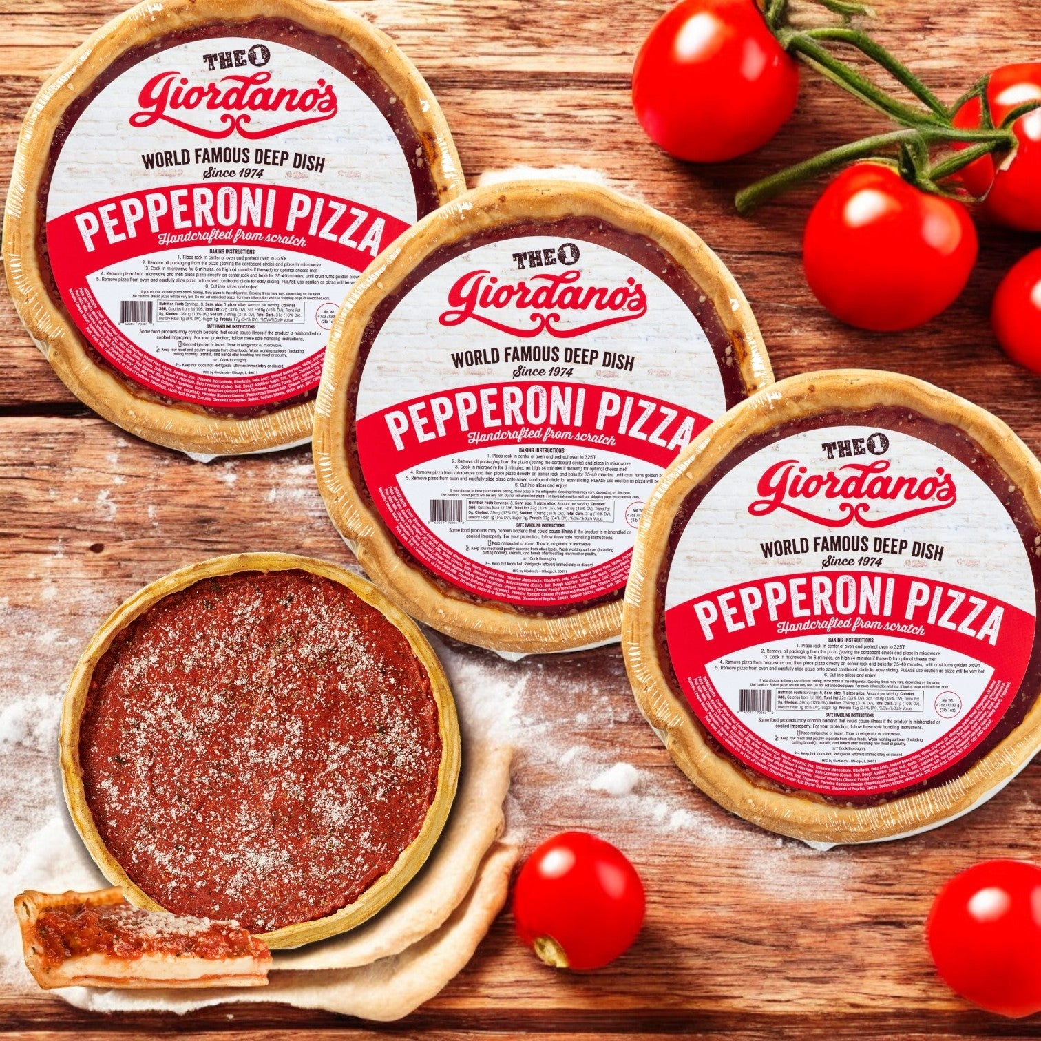 Three Giordano's Frozen Deep Dish Stuffed - Pepperoni Pizzas, 10" - 3 Pack wait nearby while a fresh, unbaked deep dish sits on a wooden surface, surrounded by vibrant tomatoes.