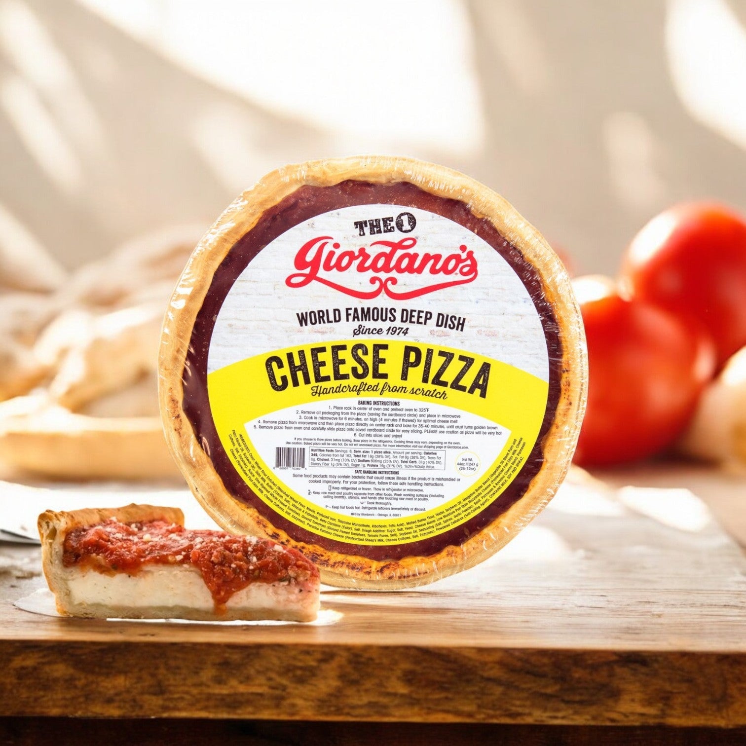 A pack from Giordano's Frozen Deep Dish Stuffed - Cheese Pizza, 10" - 3 Pack is on a wooden surface, with a perfectly cut slice beside it, highlighting its tempting layers.
