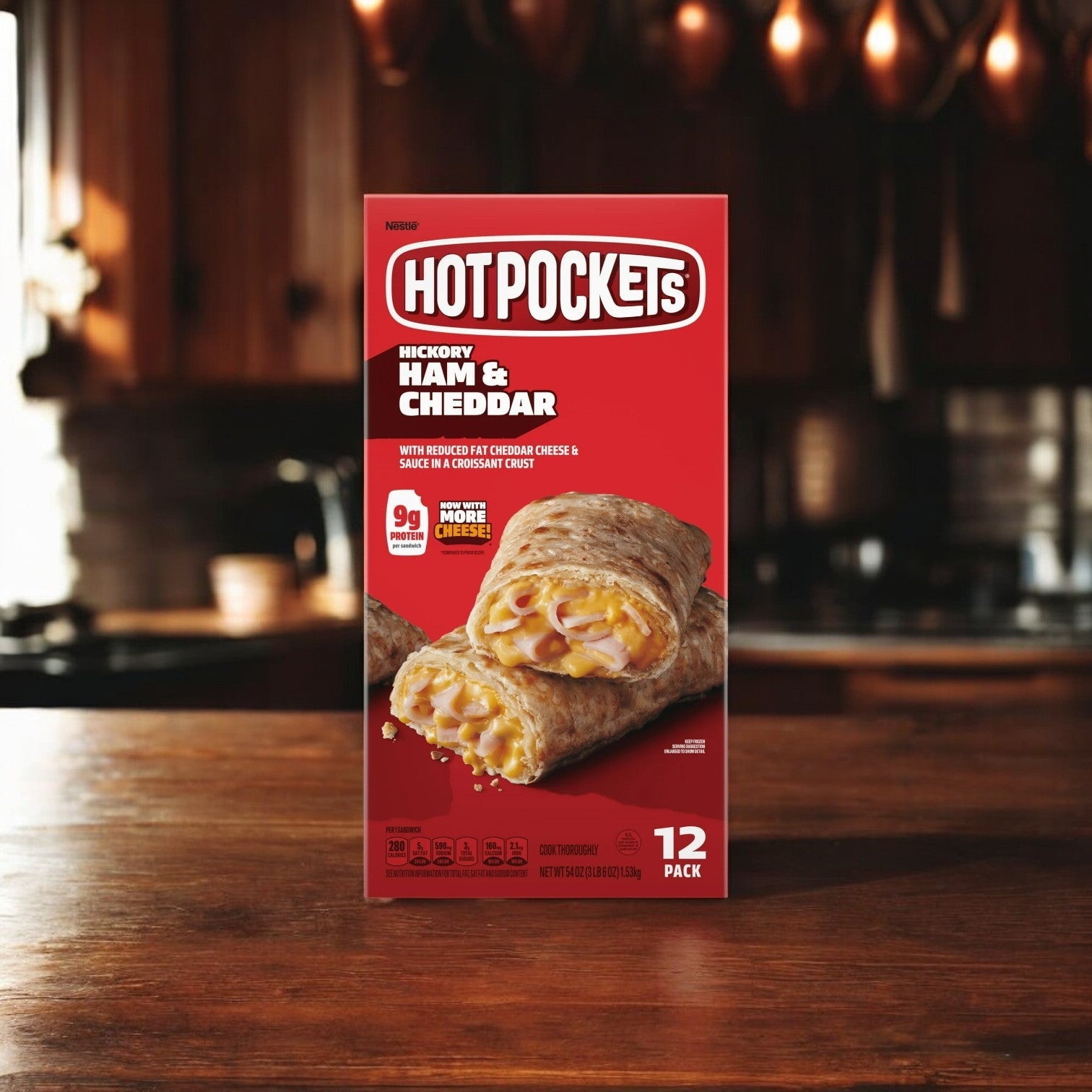 A Hot Pockets Bundle Pack, featuring 9 total boxes, sits on a wooden kitchen counter in warm lighting. Perfect for frozen snack lovers, this delicious treat is ideal alone or as part of the variety pack.