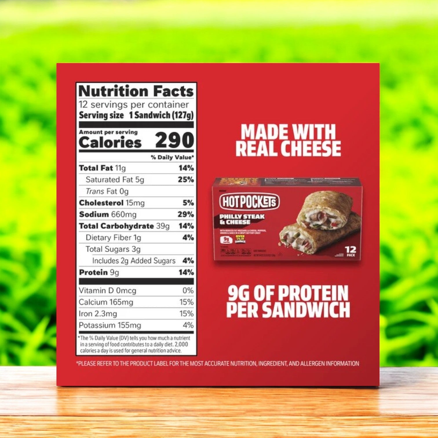 Box of Hot Pockets Philly Steak and Cheese – 12 Count, showcasing details like "Made with Real Cheese" and "9g of Protein per Sandwich," presented on a wooden surface with a green blurred background.
