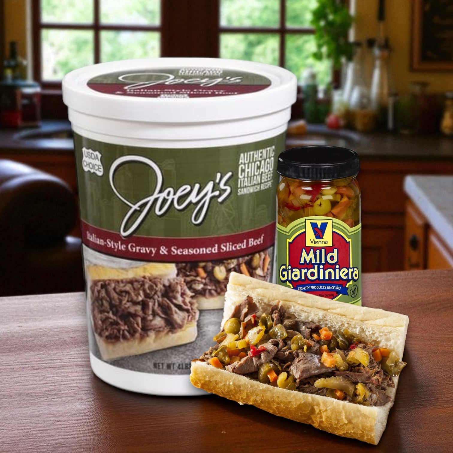 A package of Joey's Italian-Style Sliced Beef with Gravy & Vienna Beef Mild Giardiniera from Joey's Italian Beef is displayed alongside a Chicago-style beef sandwich topped with giardiniera.