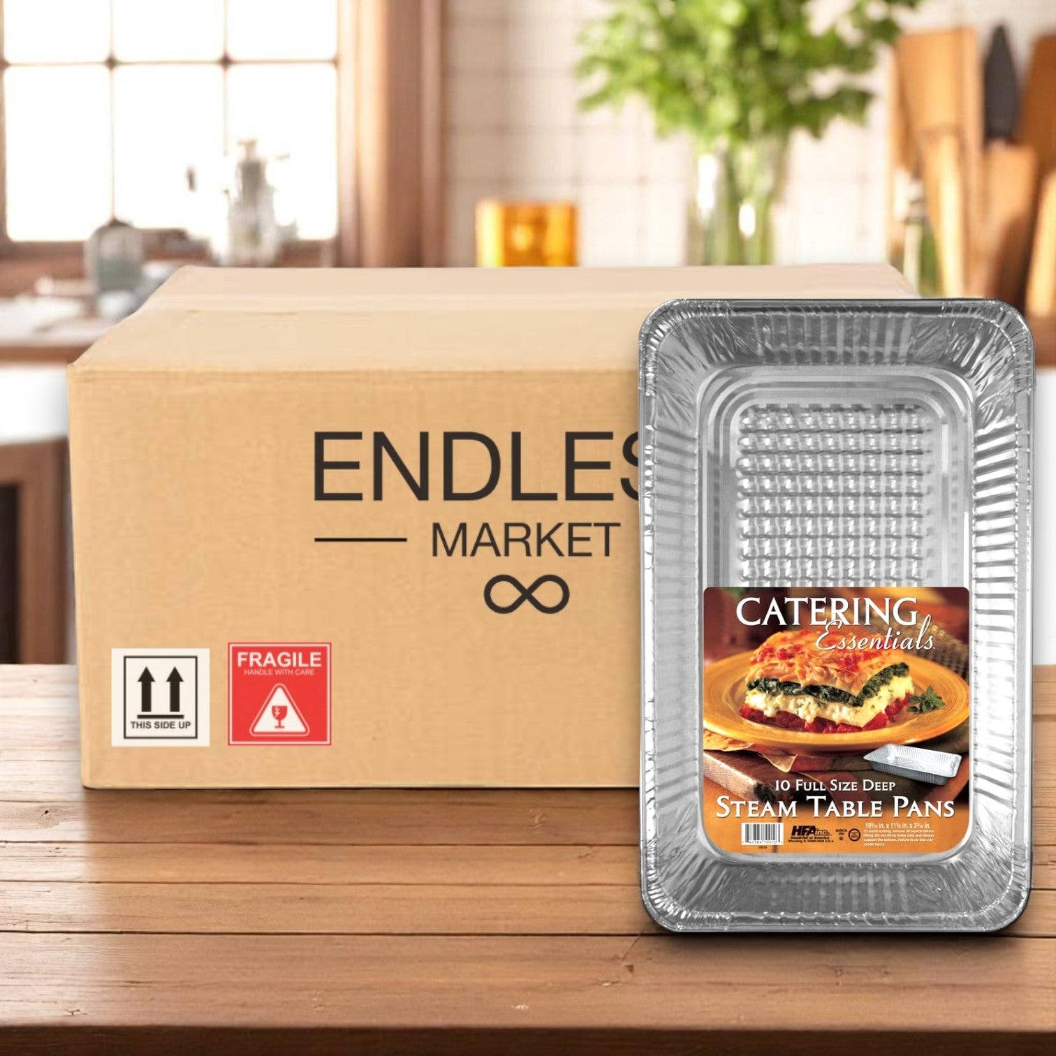 A Handi-Foil of America box sits on a kitchen counter next to a 10-pack of HFA Deep Full-Size Steam Table Pans (60 total per case), ideal for catering or food storage.
