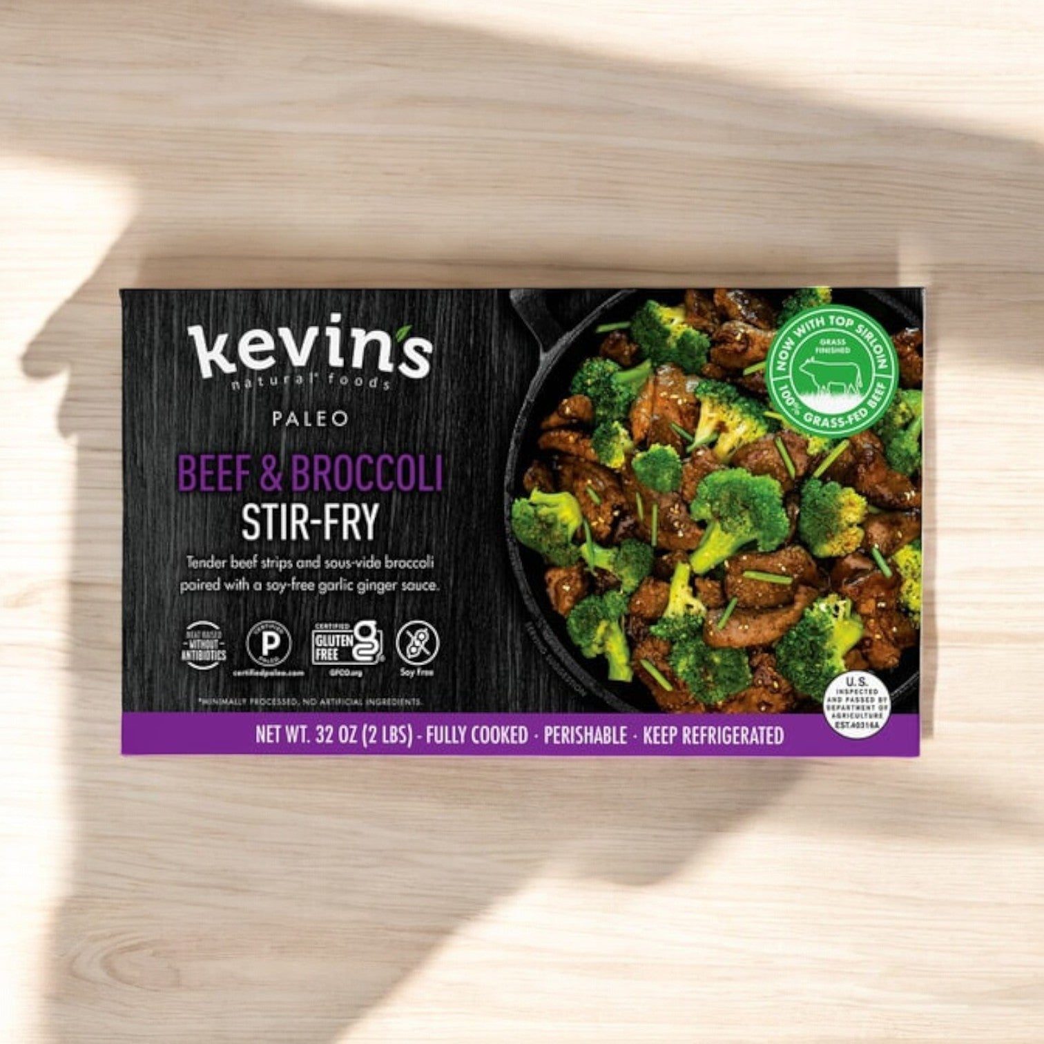 Kevin's Beef & Broccoli Stir-Fry, 32 oz - 1 Count, is gluten-free and made with premium grass-fed beef. It includes beef strips, broccoli, and ginger sauce with no preservatives. The fully cooked meal offers quick and easy deliciousness!.
