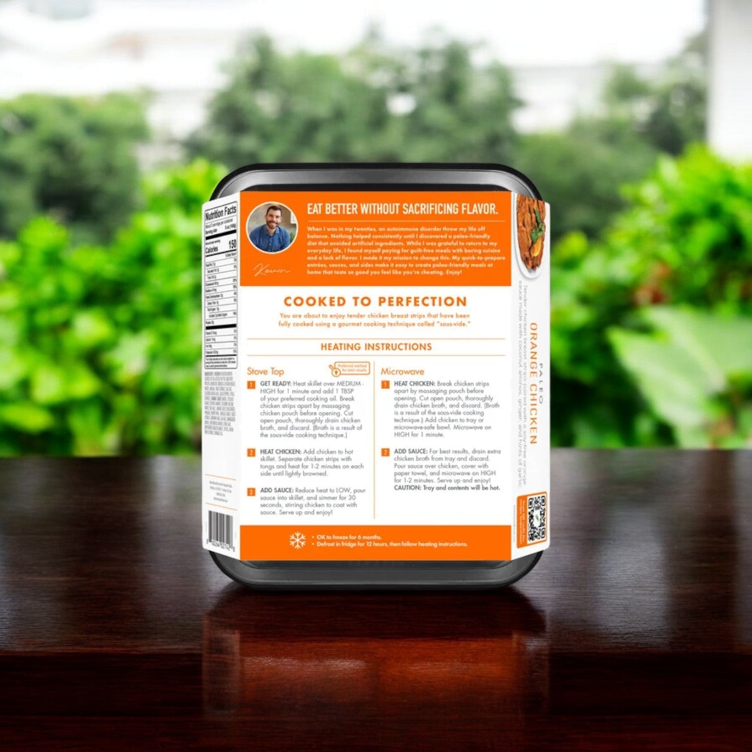 A 16 oz. pack from Kevin's Orange Chicken case, displayed on wood, includes cooking instructions and nutritional info on the back. Ships frozen with a 30-day cooler shelf life post-freezer.