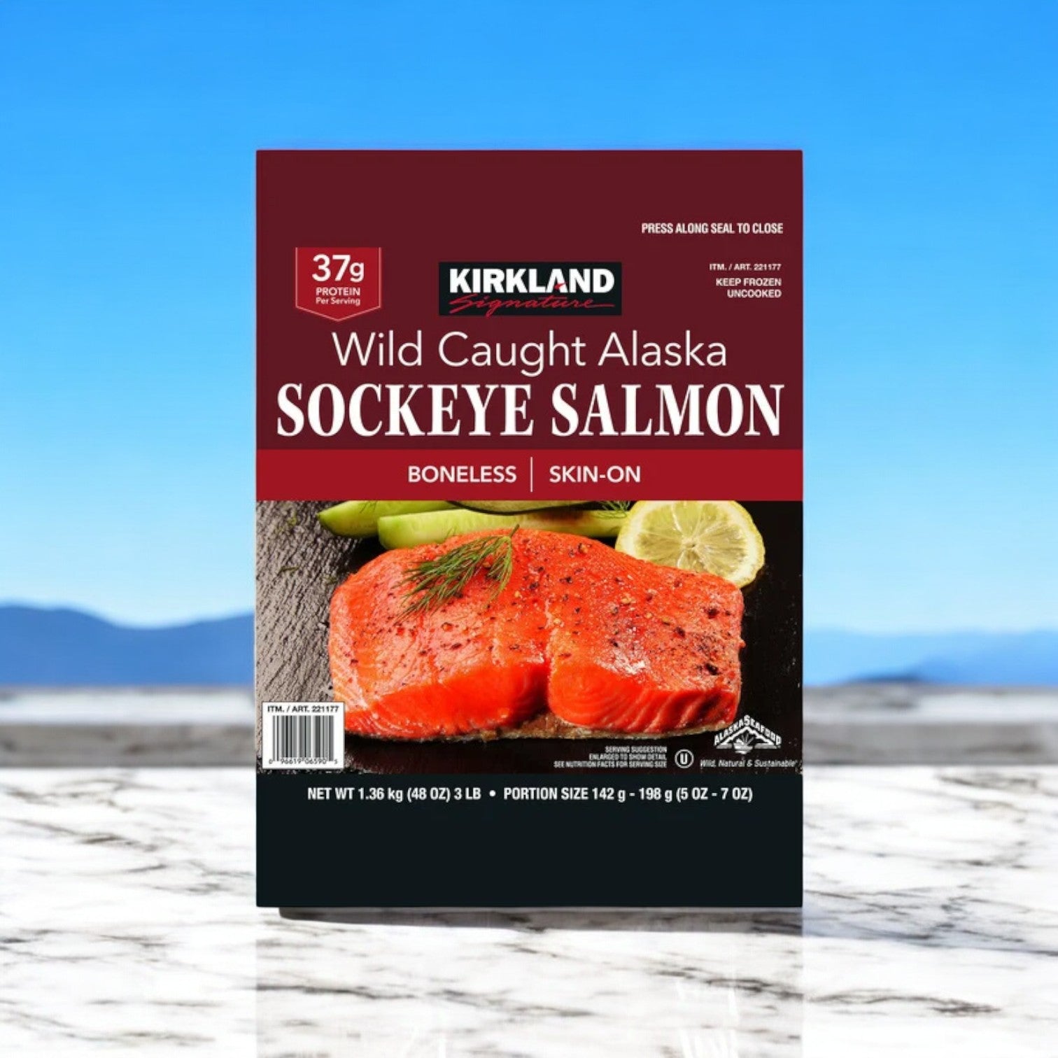 Kirkland Signature Wild Alaskan Sockeye Salmon packaging features boneless, skin-on fillets (5-7 oz) per portion, totaling 3 lbs per pack and rich in omega-3 fatty acids.