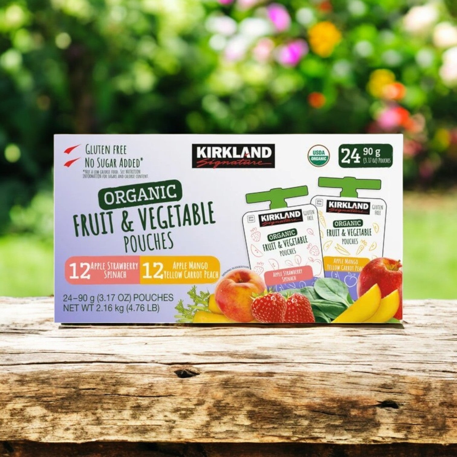 A box of Kirkland Signature Organic Fruit and Vegetable Pouches Variety Pack, 24-count (3.17 oz each), is displayed on a wooden surface, featuring flavors like strawberry spinach and apple mango—ideal for a healthy lifestyle.