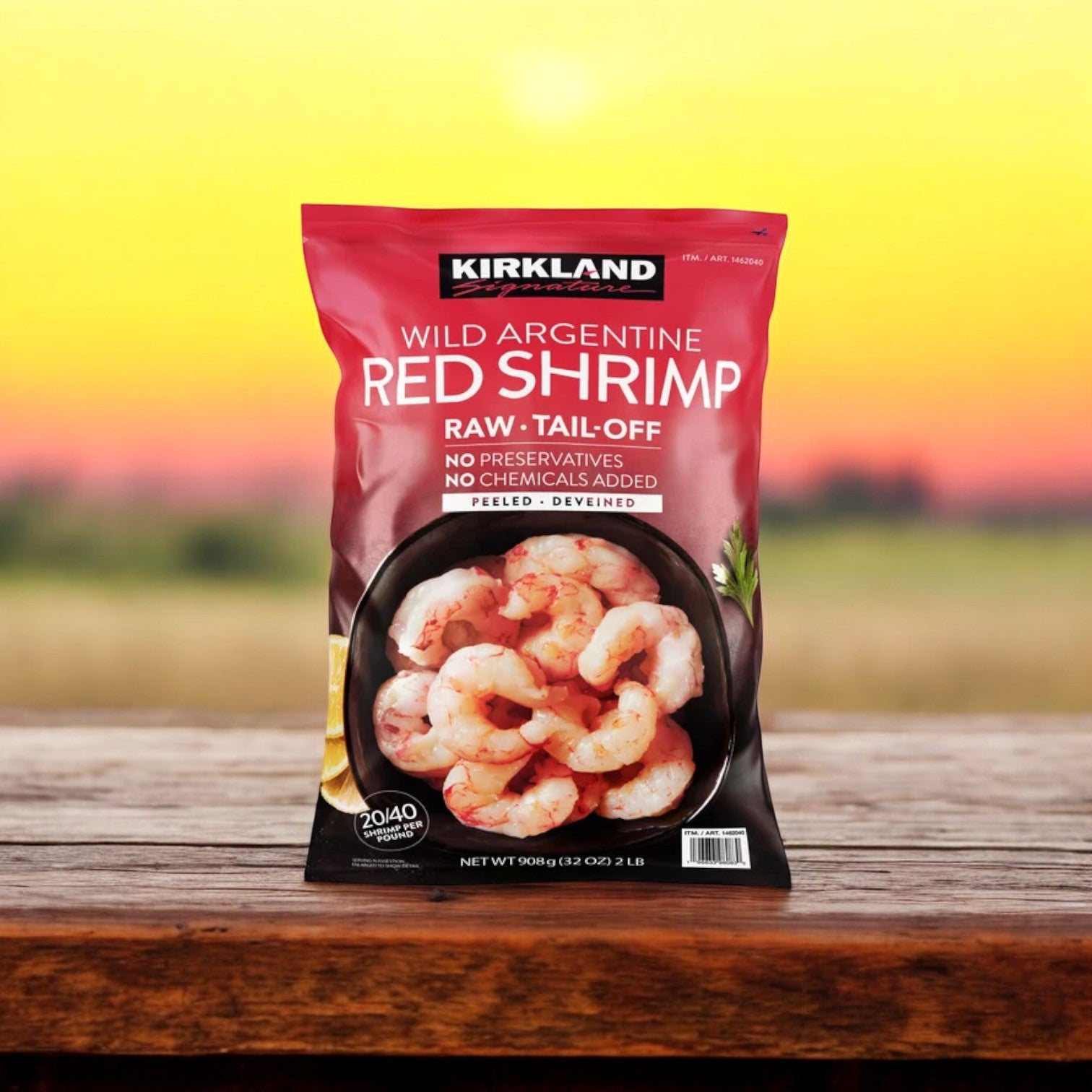 A bag of Kirkland Signature Wild Argentine Raw Shrimp, set against a blurred outdoor background, highlights the wild-caught shrimp's freshness. It's frozen with no preservatives or chemicals added, ensuring quality.