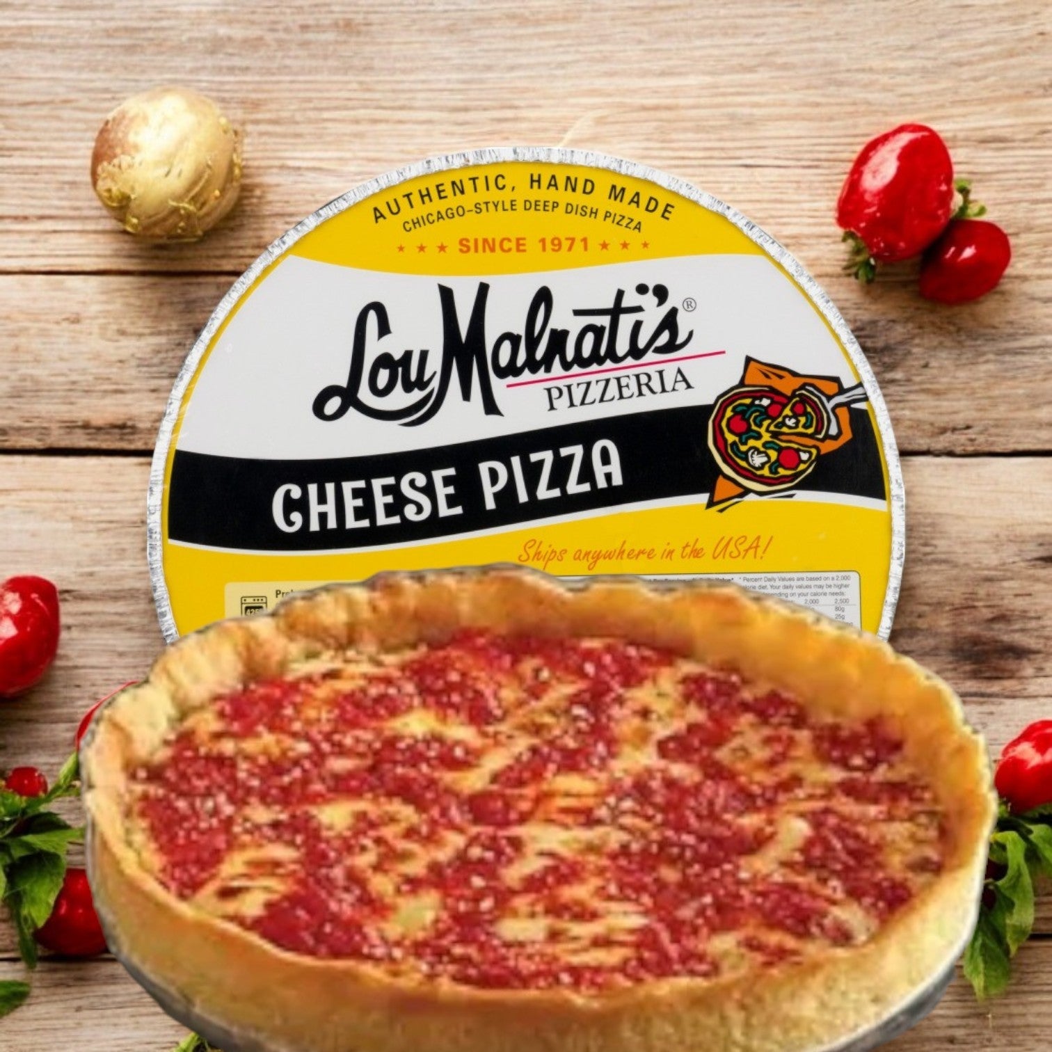 A 23 oz. Lou Malnati's Deep Dish Pizza Cheese tantalizingly rests in front of its Lou Malnati's packaging, flanked by fresh tomatoes and garlic on a rustic wooden surface.