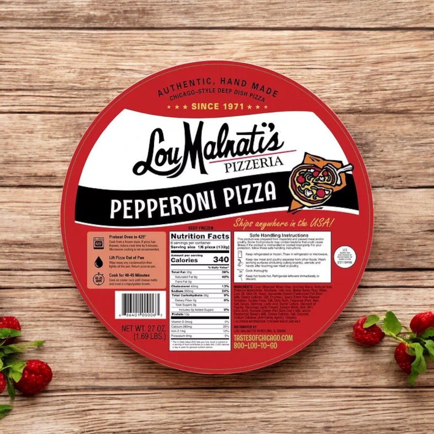 A round package from Lou Malnati's Deep Dish Combo- 2 Pack Combo! sits on a wooden surface, surrounded by red peppers and sprigs of herbs. The label features nutritional information and heating instructions, promising an authentic deep dish experience.