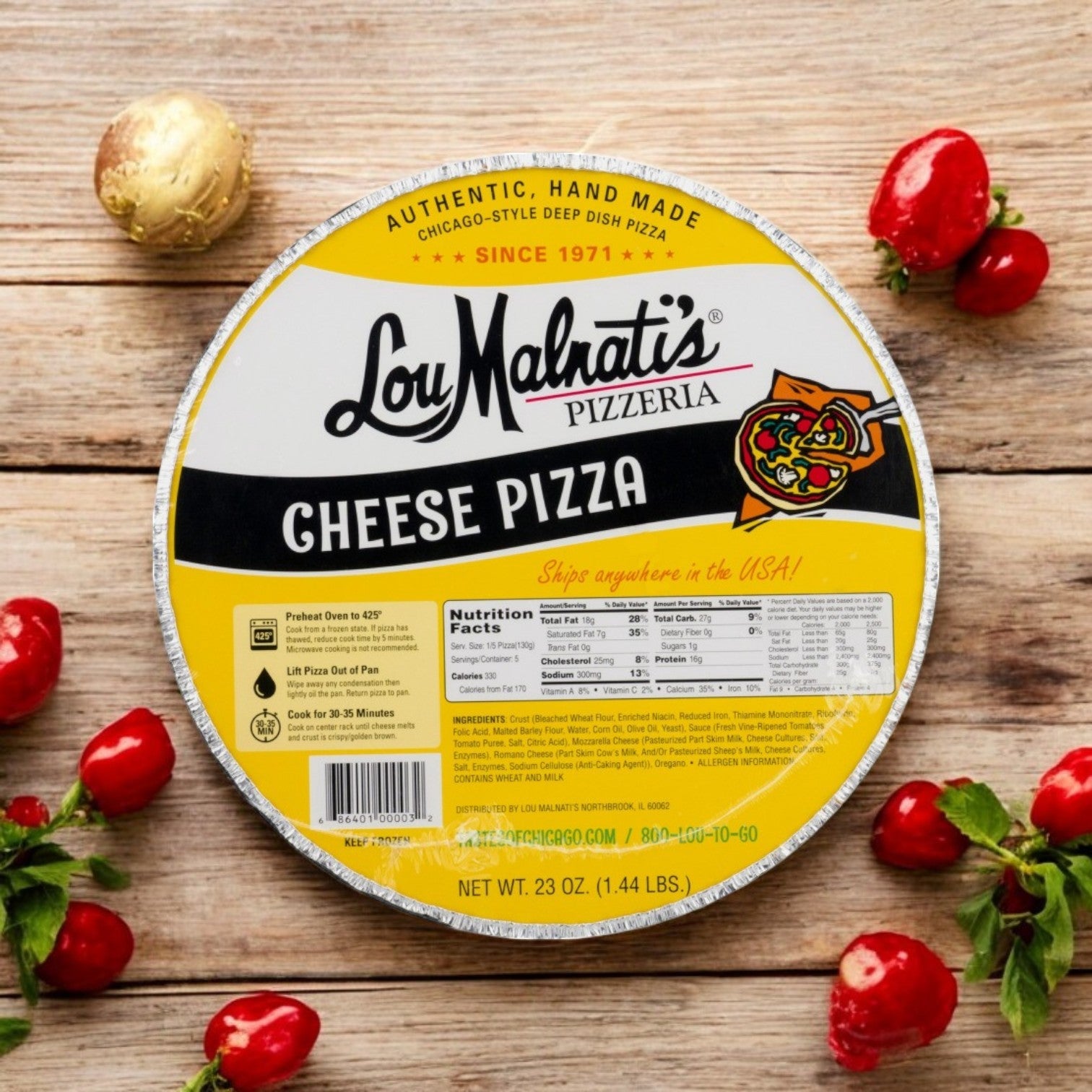 A 23 oz Lou Malnati's Deep Dish Pizza Cheese rests on a wooden surface, its rich mozzarella cheese delicately visible, adorned by scattered red peppers and greens.