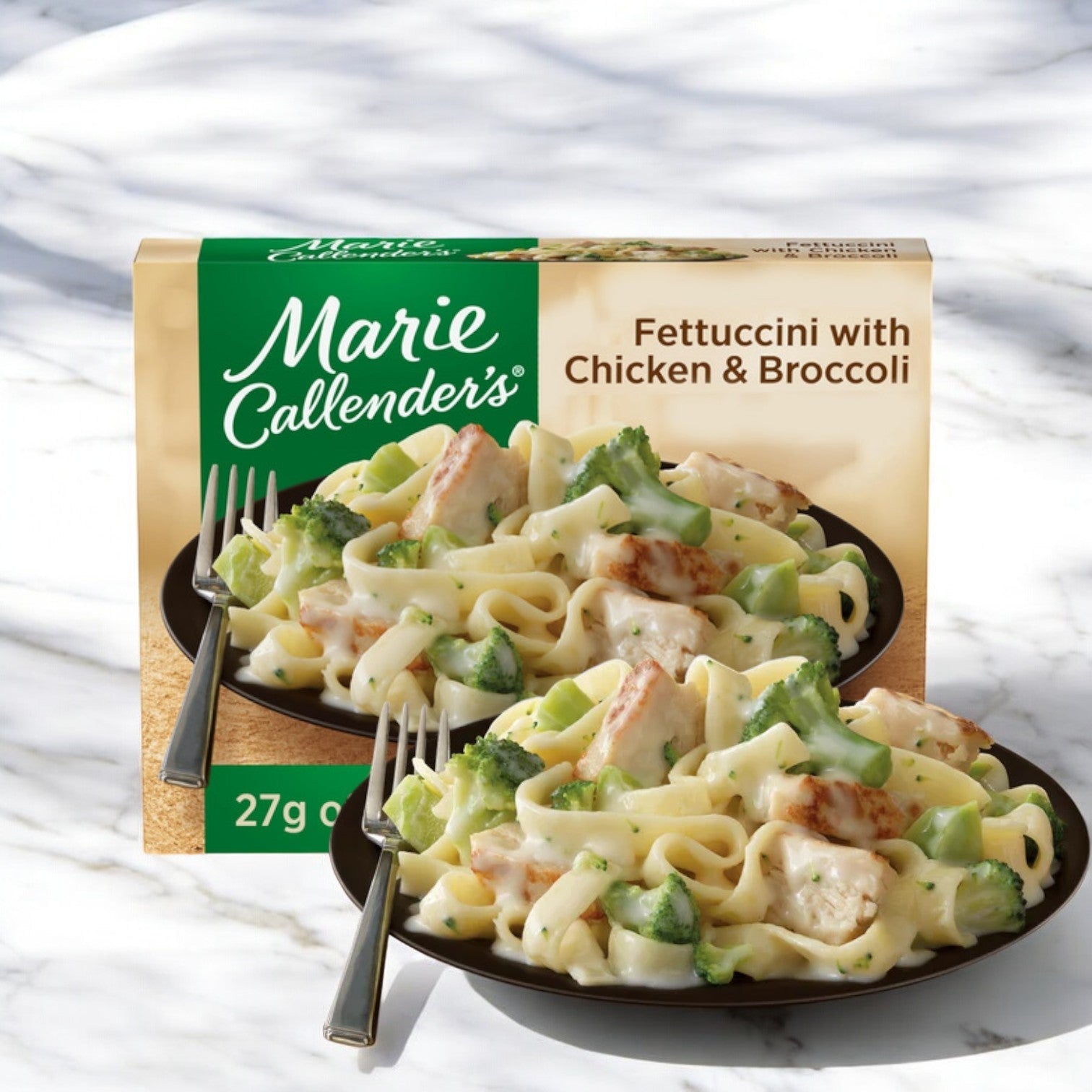 Packaging for Marie Callender's Fettuccini With Chicken & Broccoli, 13 oz. - 1 Count, next to a plated serving of the frozen meal featuring pasta, chicken, broccoli, and a creamy sauce.