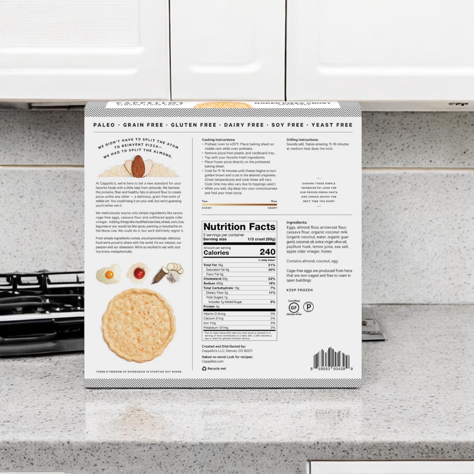 On a kitchen counter, the packaging of Cappello's Grain Free Naked Pizza Crust (6 oz, 3 Count) displays dietary info and nutritional facts. Highlights include paleo, gluten-free, and grain-free features.