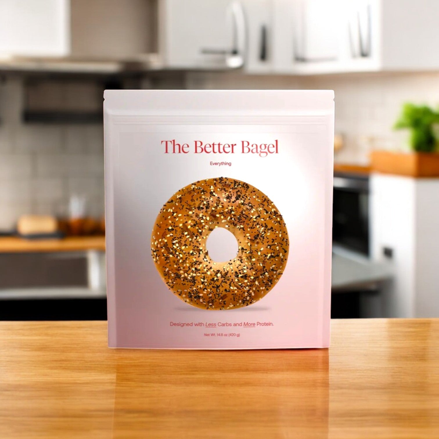 A BetterBrand package named "Better Brand - Better Brand Variety Pack" with an image of The Everything Bags sits on a wooden kitchen counter, featuring 8 total bags and 32 bagels, in stock and ready to ship.