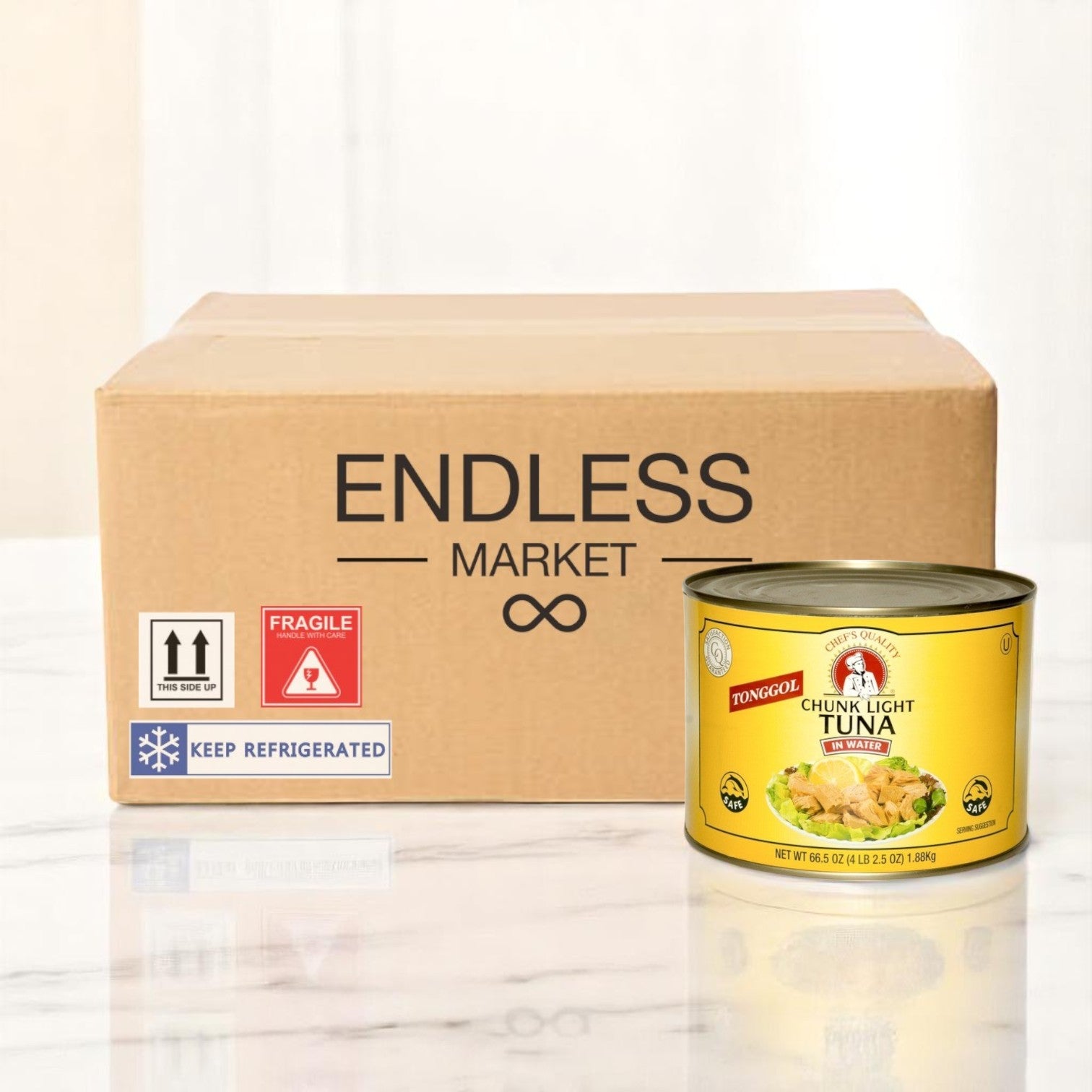 A 66.5 oz can of Chef's Quality Tongol Chunk Light Tuna in Water is displayed in front of a Chef's Quality box—ideal for foodservice kitchens seeking quality bulk tuna with easy shipping and refrigeration labels.