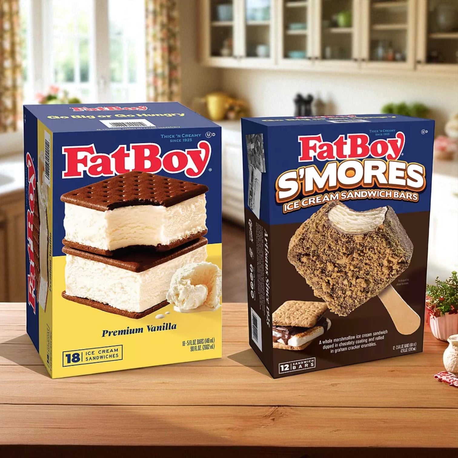 Two boxes of FatBoy Smores Sandwich Bars & Premium Vanilla Ice Cream Sandwich Combo sit on the counter—offering tasty FatBoy treats that are perfect for any sweet tooth.