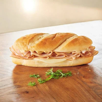 The E.A. Sween Sandwich Combo 5 Items offers a delicious variety pack with premium ingredients, including turkey and cheese garnished with fresh herbs. It's perfect for satisfying grab-and-go options, ships frozen, and lasts 30 days in the cooler once defrosted.