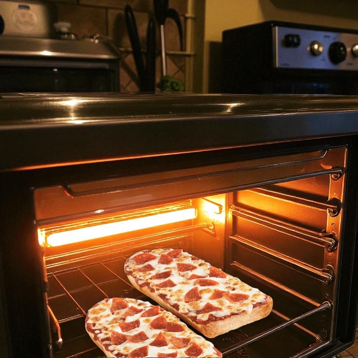 A single Endless Market DRAFT - Stouffer’s Pepperoni French Bread Frozen Pizza is baking on the oven rack, oven door open and light on, filling the kitchen with the delicious aroma of frozen pizza.