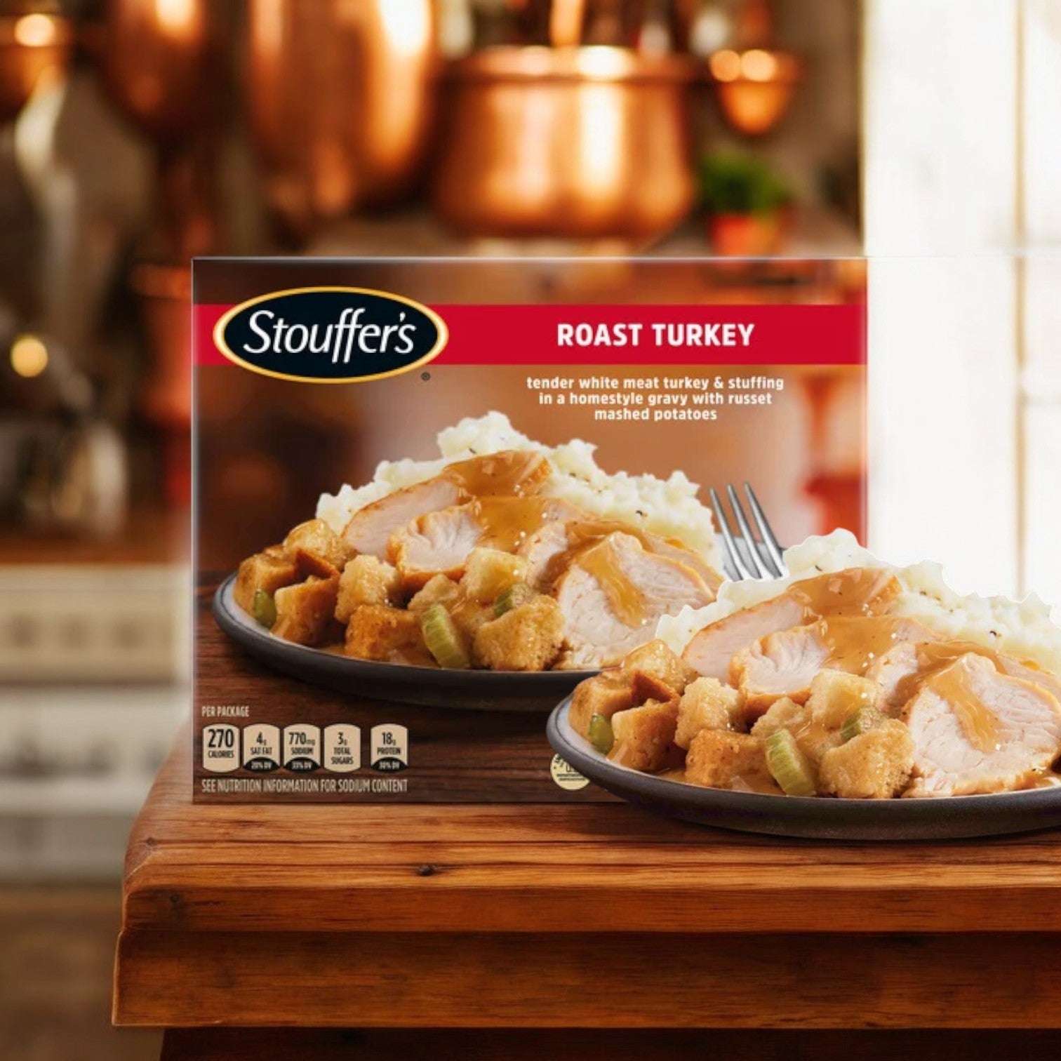 A Stouffer's Bundle! 9 Total, featuring the Roast Turkey meal, rests on a wooden kitchen surface with copper cookware, ideal for those desiring convenient meals with flavor and warmth.