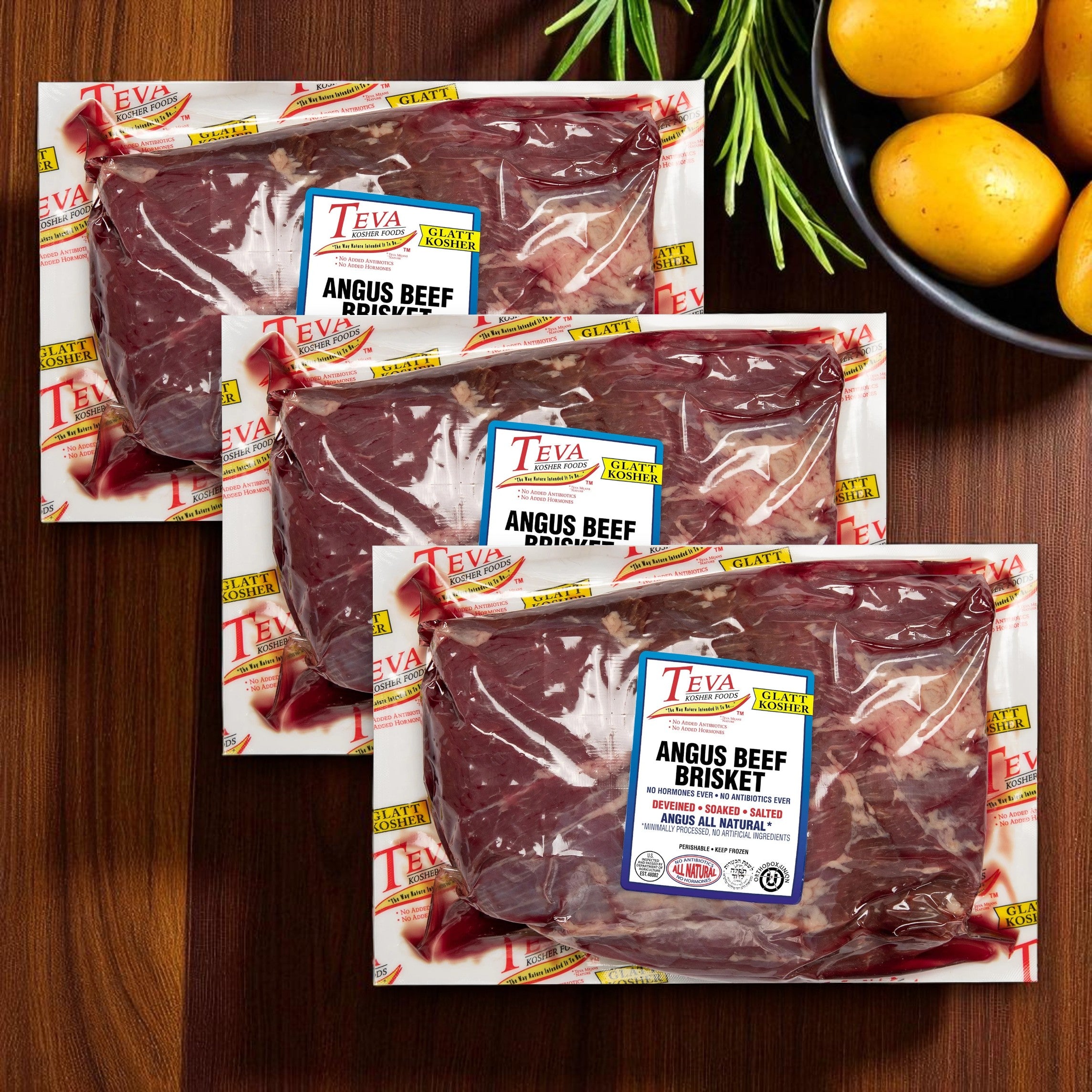 Three packs of Endless Market Teva Glatt Kosher Angus Beef Brisket (2.78 lbs each) are displayed on a wooden surface alongside yellow potatoes and fresh rosemary sprigs.