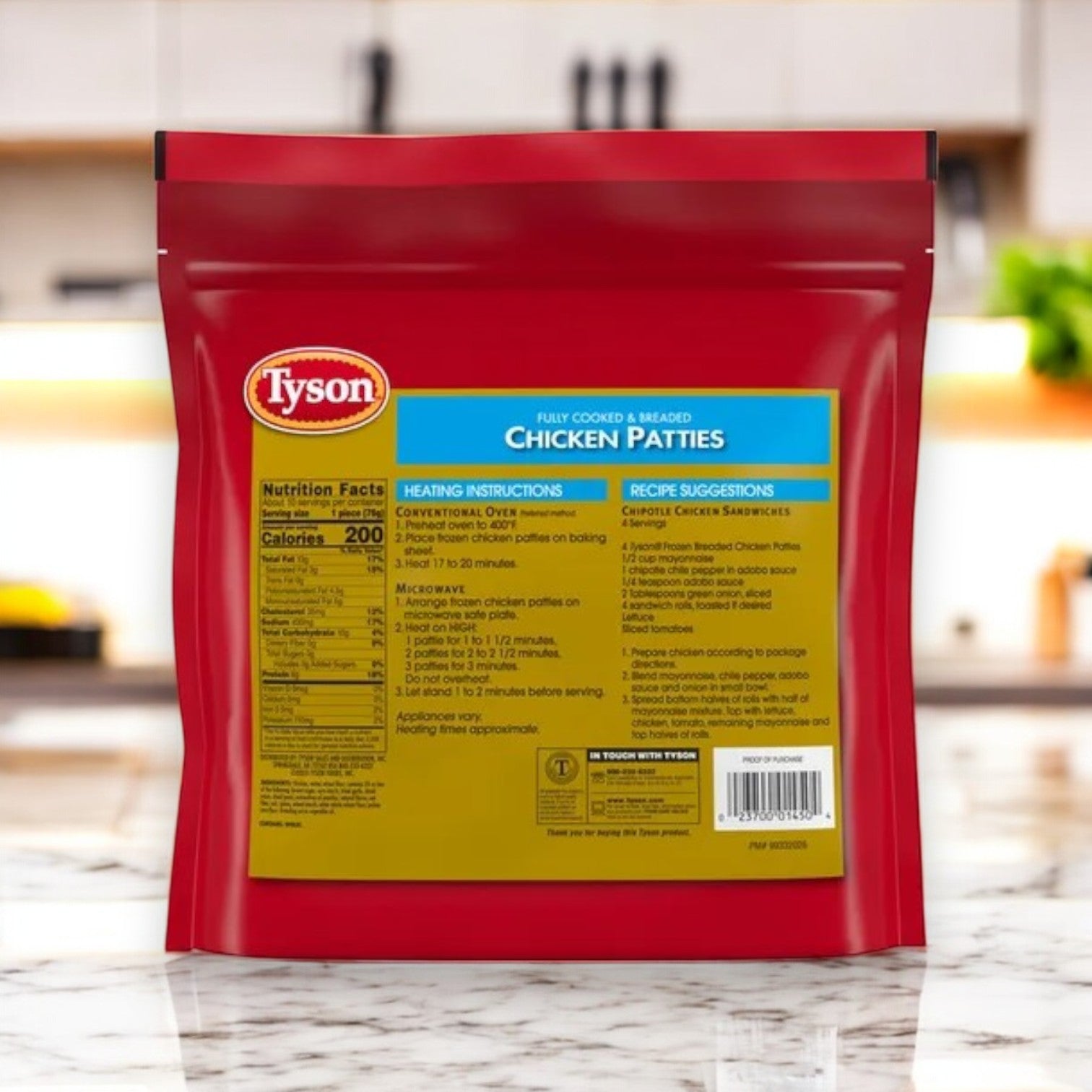 A red package of Tyson Breaded Chicken Patties – Fully Cooked, a 26 oz bag by Tyson, is on the kitchen counter displaying nutritional information and cooking instructions.