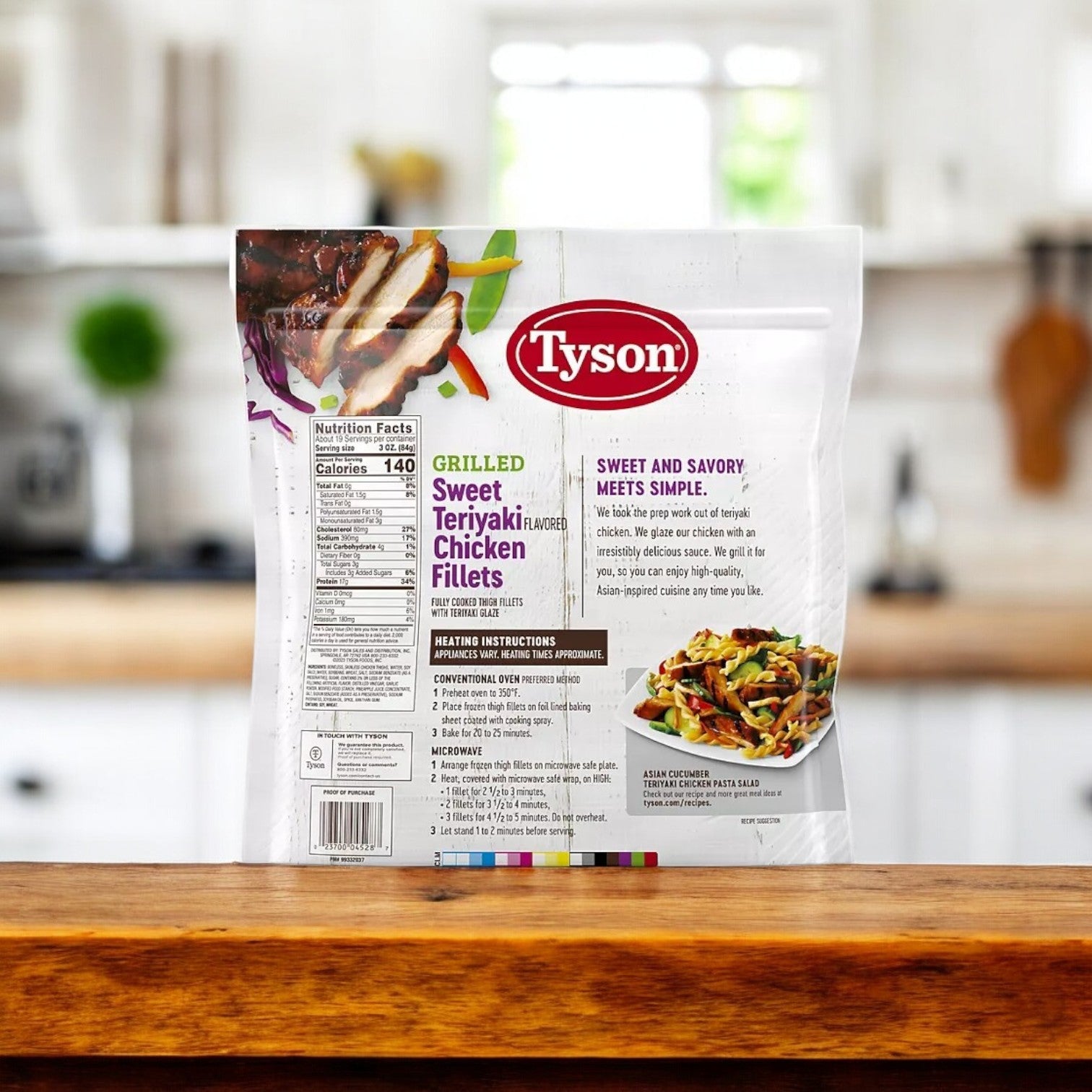 A 3.5 lb. bag of Tyson Grilled Sweet Teriyaki Flavored Chicken Fillets is on the kitchen counter, highlighting its enticing flavor with detailed nutritional information and cooking instructions, ideal for creating an Asian-inspired culinary experience at home.