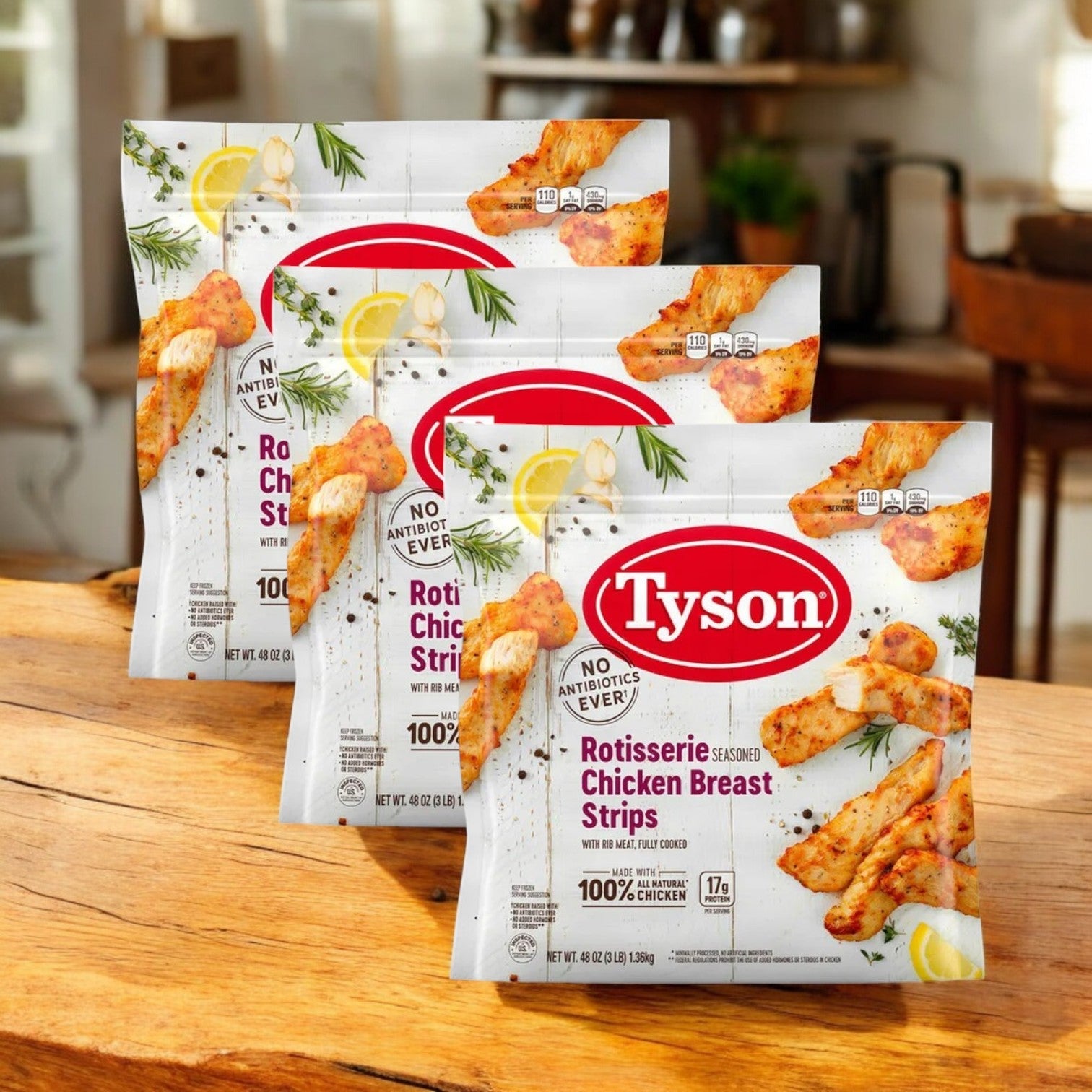 Three bags of Tyson Rotisserie Seasoned Unbreaded Chicken Breast Strips (48 oz each) are showcased on a wooden kitchen surface, emphasizing their high-protein quality.