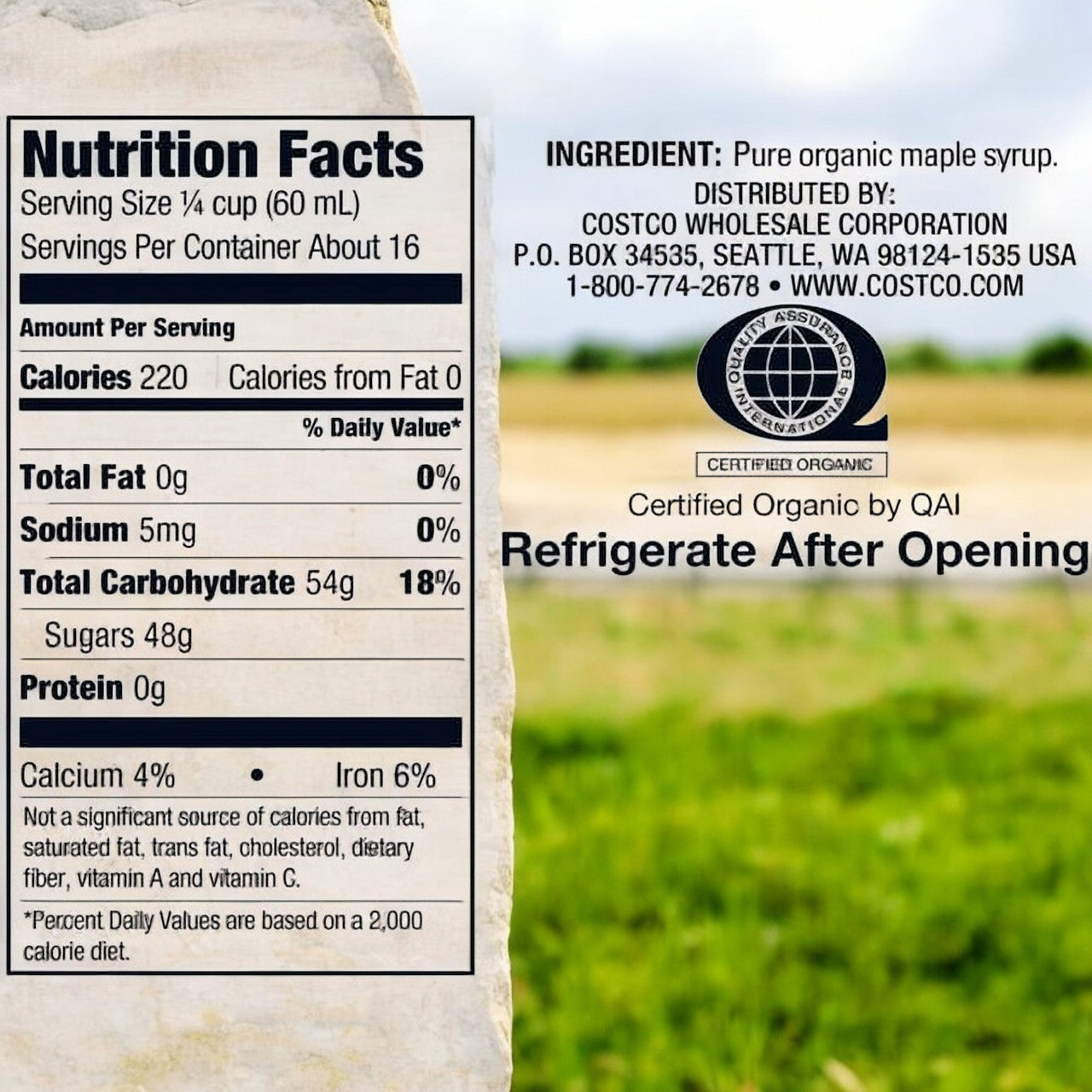The Kirkland Signature Organic Pure Maple Syrup nutrition label lists calories, fat, sodium, carbohydrates, and protein. This USDA-certified organic product includes an ingredient list and refrigerate-after-opening instructions against a blurred outdoor background.