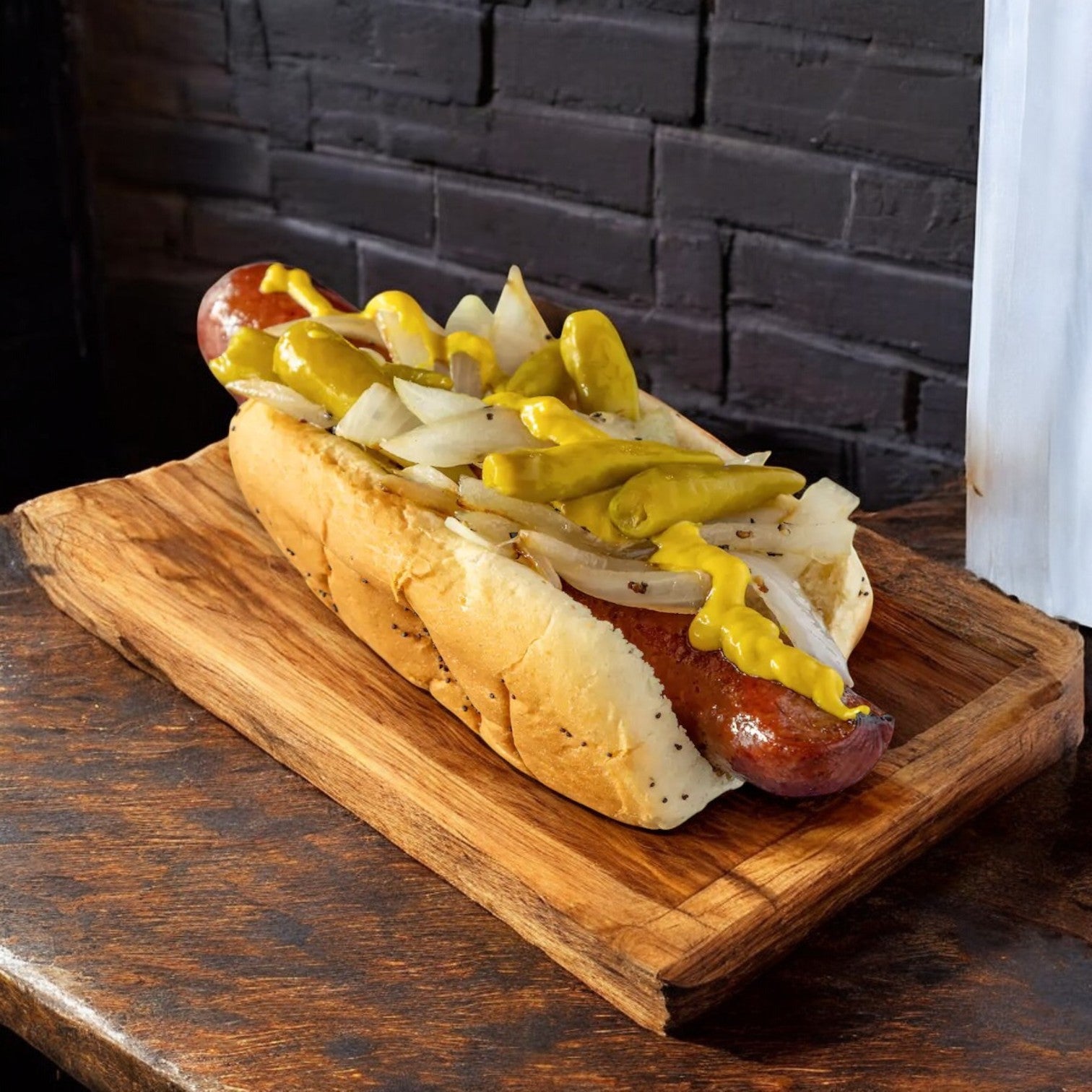 A Vienna Beef Polish Sausage, a 6" skinless smoked cooked beef kielbasa, is nestled in a bun, garnished with mustard, onions, and peppers on a wooden board.