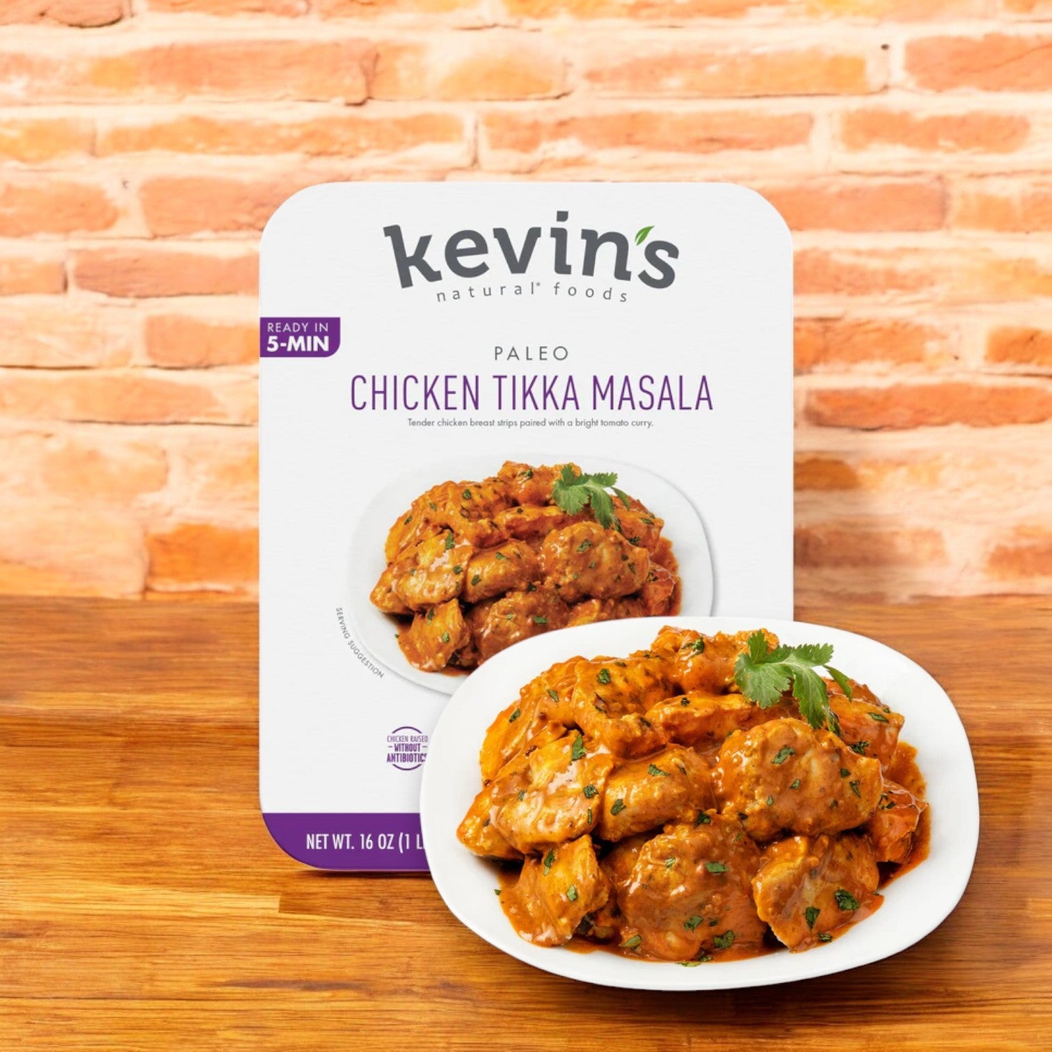 Kevin's Chicken Tikka Masala - 16 oz. - 1 Count box with a plated serving in front, made with all-natural ingredients to deliver authentic Indian cuisine from Kevin's.