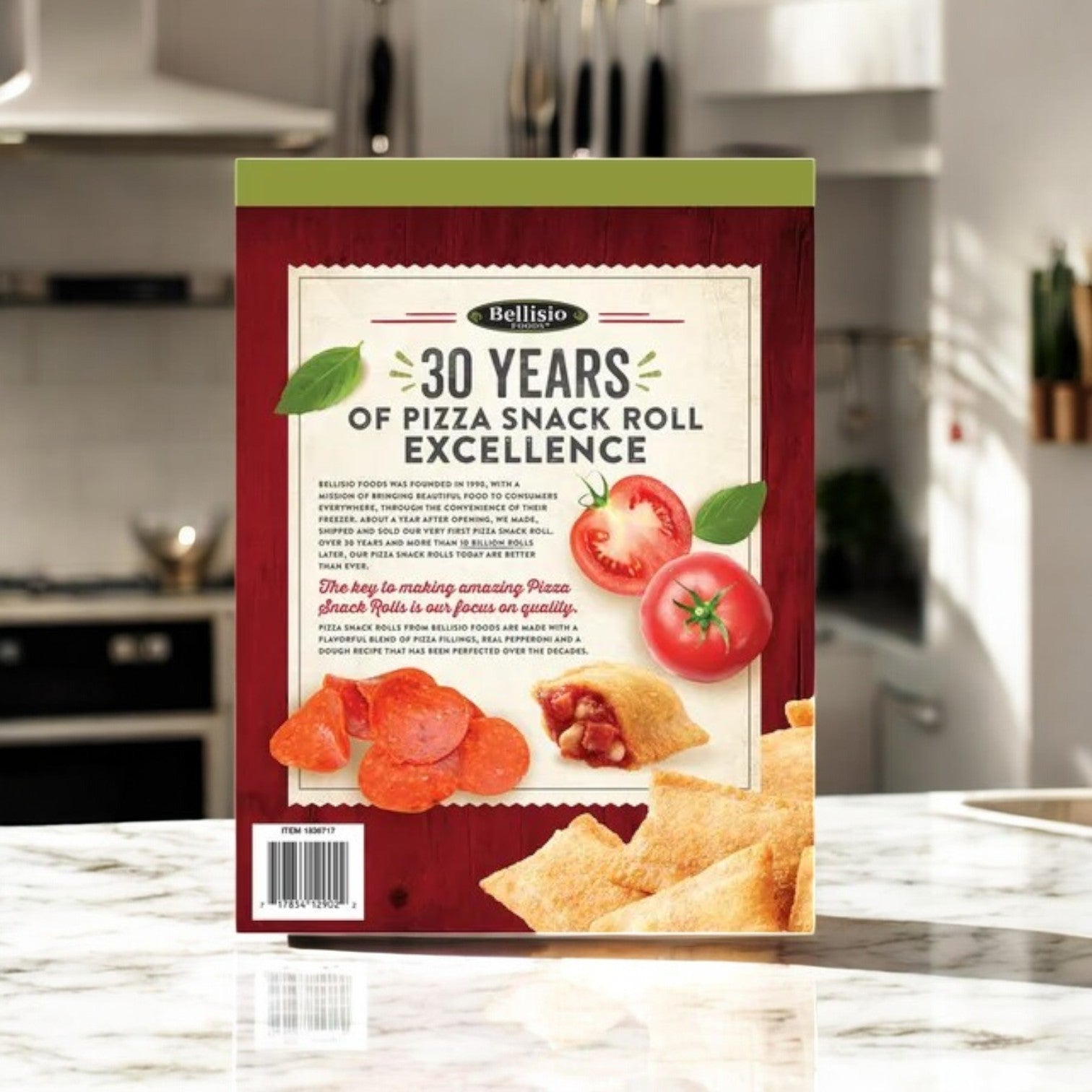 On a kitchen counter sits a box of Bellisio Foods Pizza Snack Rolls, 60 Oz, featuring vibrant images of tomatoes and pepperoni. Celebrating 30 years of excellence, these treats epitomize frozen snack luxury with their delightful pepperoni and cheese filling.