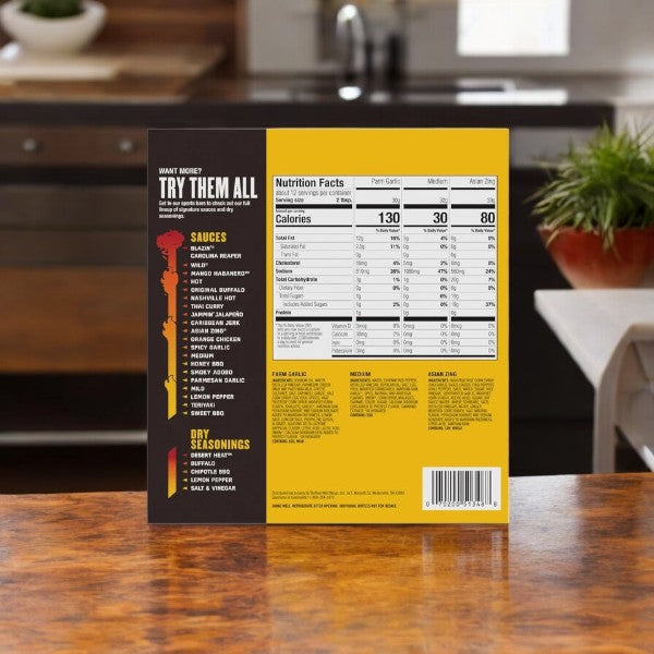 Buffalo Wild Wings Fan Favorite Variety Pack box on a kitchen counter, featuring a selection of sauces and dry seasonings on the left, with nutrition facts highlighted against a vibrant yellow background on the right.
