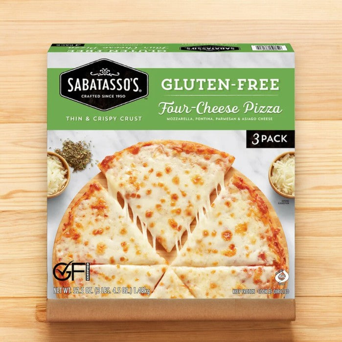 The package of Sabatasso's Gluten-Free Four Cheese Pizza, 3-Pack, features an appealing image of a perfectly cooked pizza with gooey melted cheese. Prominent on the box are the phrases "Thin & Crispy Crust" and "3 Pack," making it an excellent option for anyone looking for delicious gluten-free pizza choices.