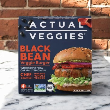 The Actual Veggies Black Bean Burger, a chef-crafted and sustainable plant-based patty, features whole veggies, is non-GMO and gluten-free. A tempting burger image adorns the box of this eco-conscious meal from Actual Veggies.